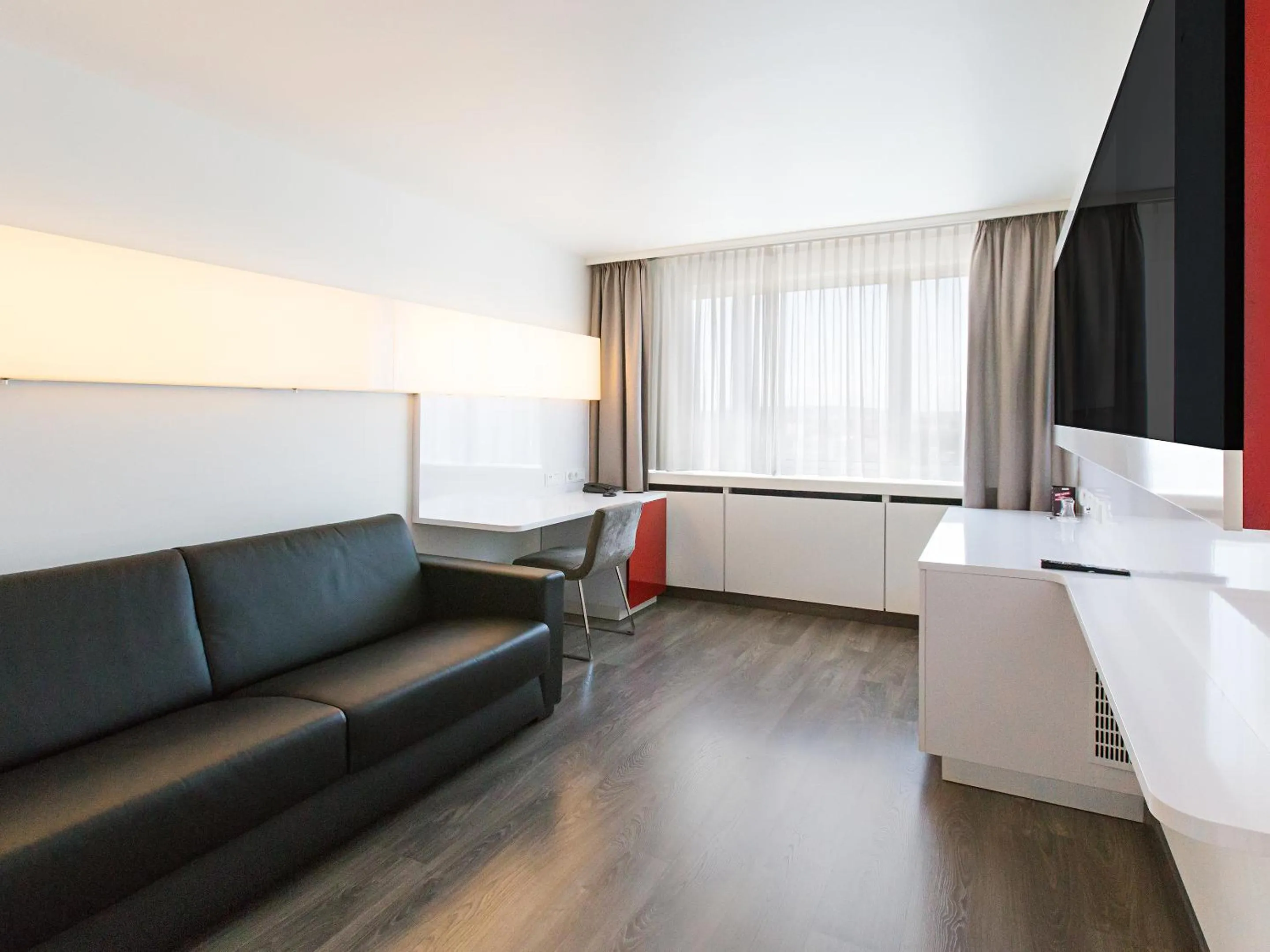 Photo of the whole room, Bed in DORMERO Hotel Stuttgart