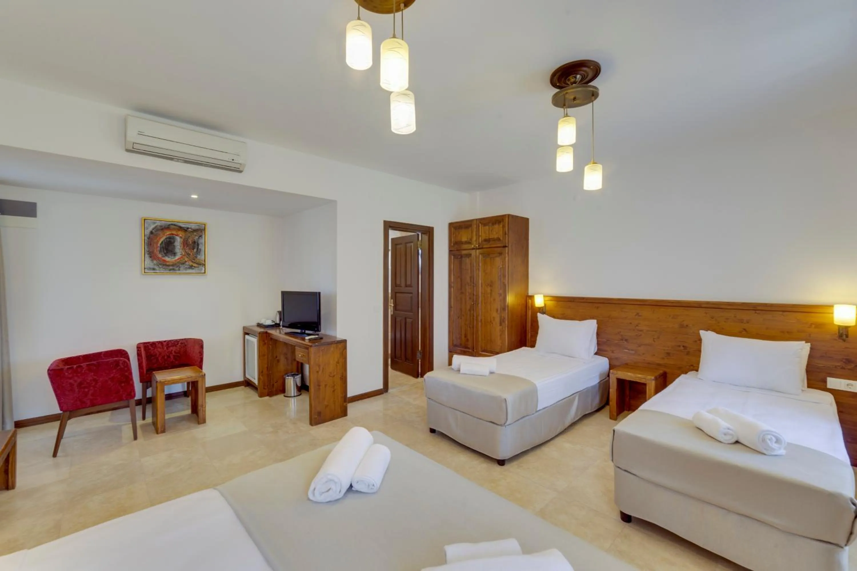 Quadruple Room in Orcey Hotel