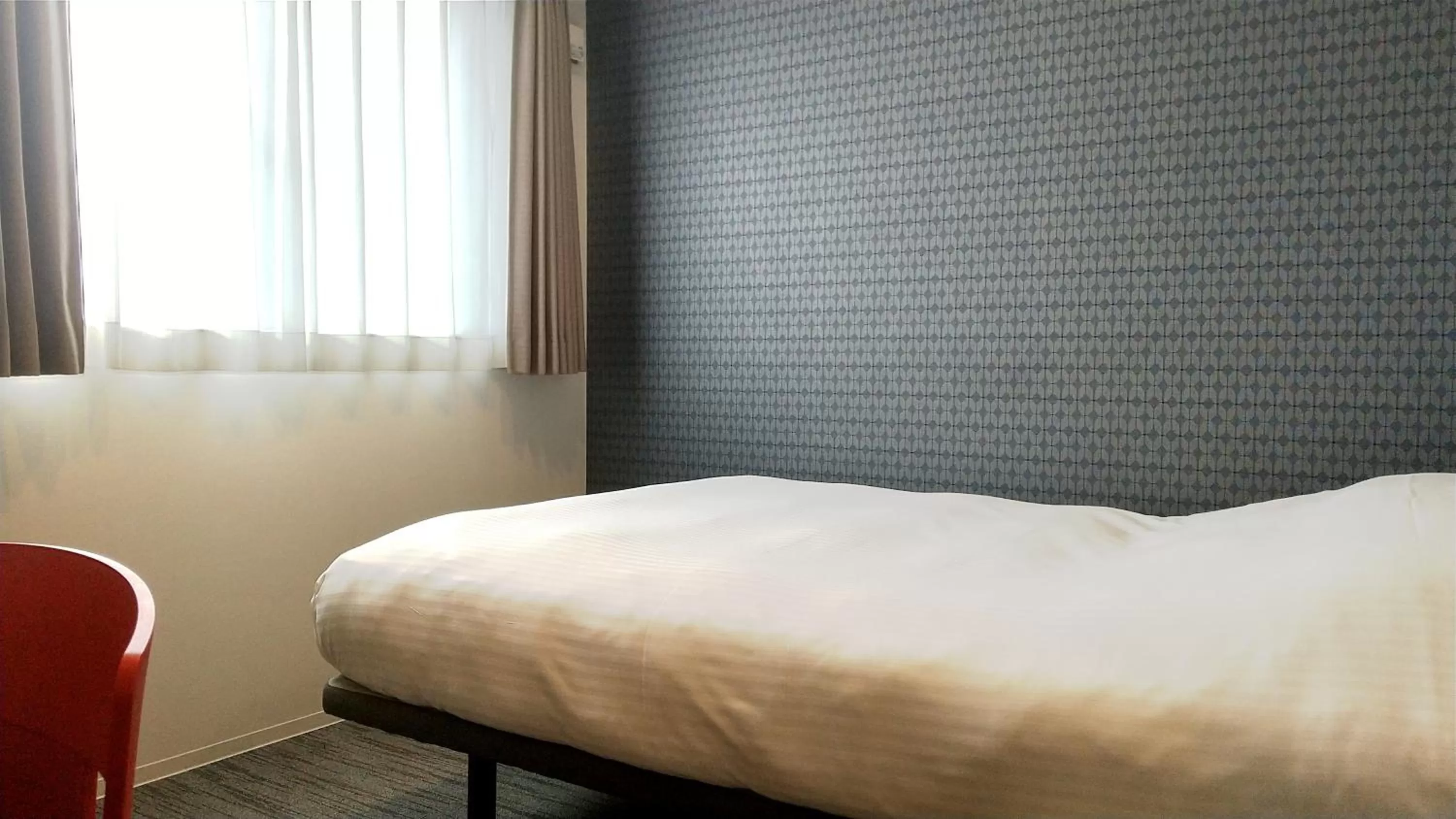 Bed in Meldia Stay Nijojo IWAGAMI