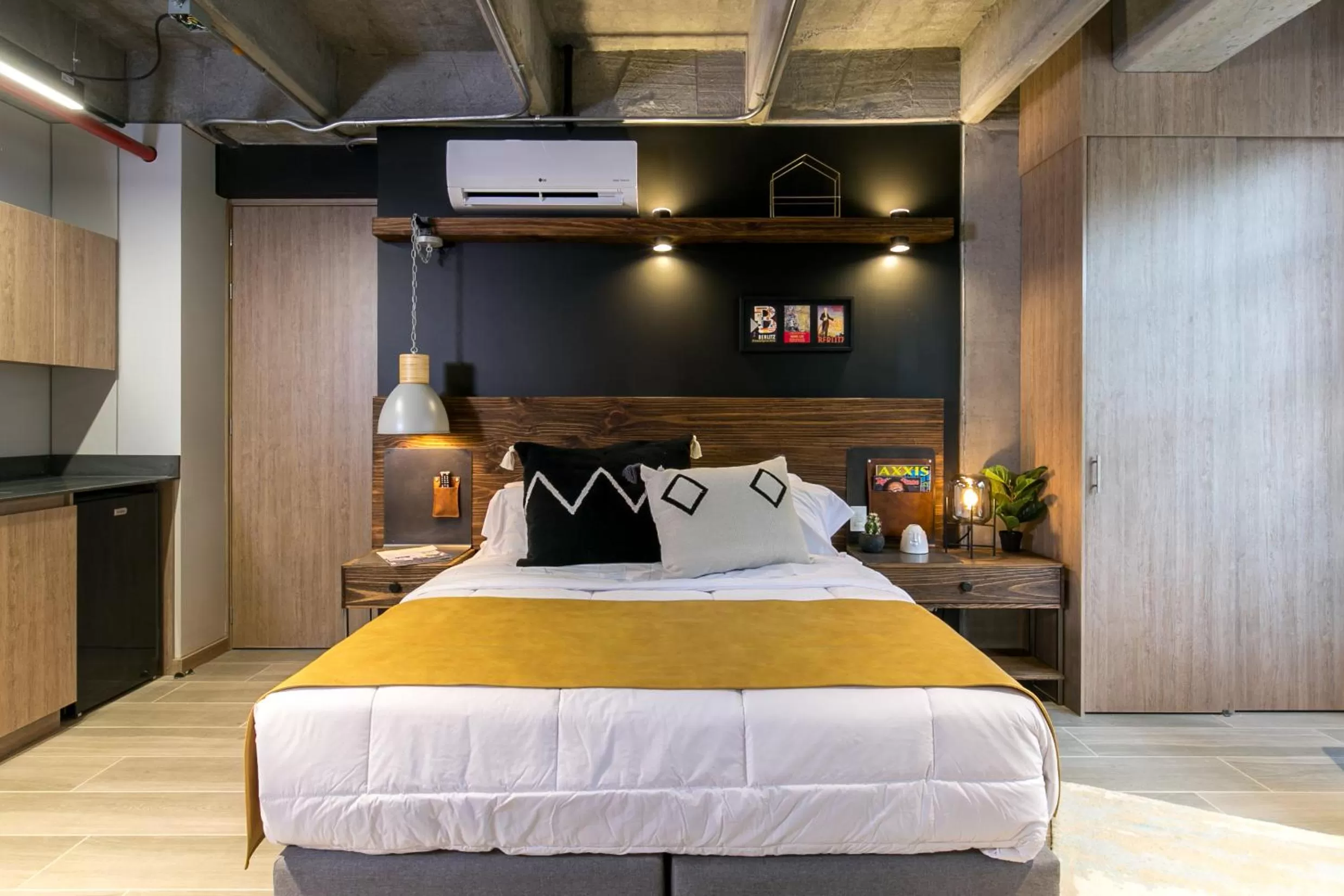 Bed in Factory Lofts Hotel