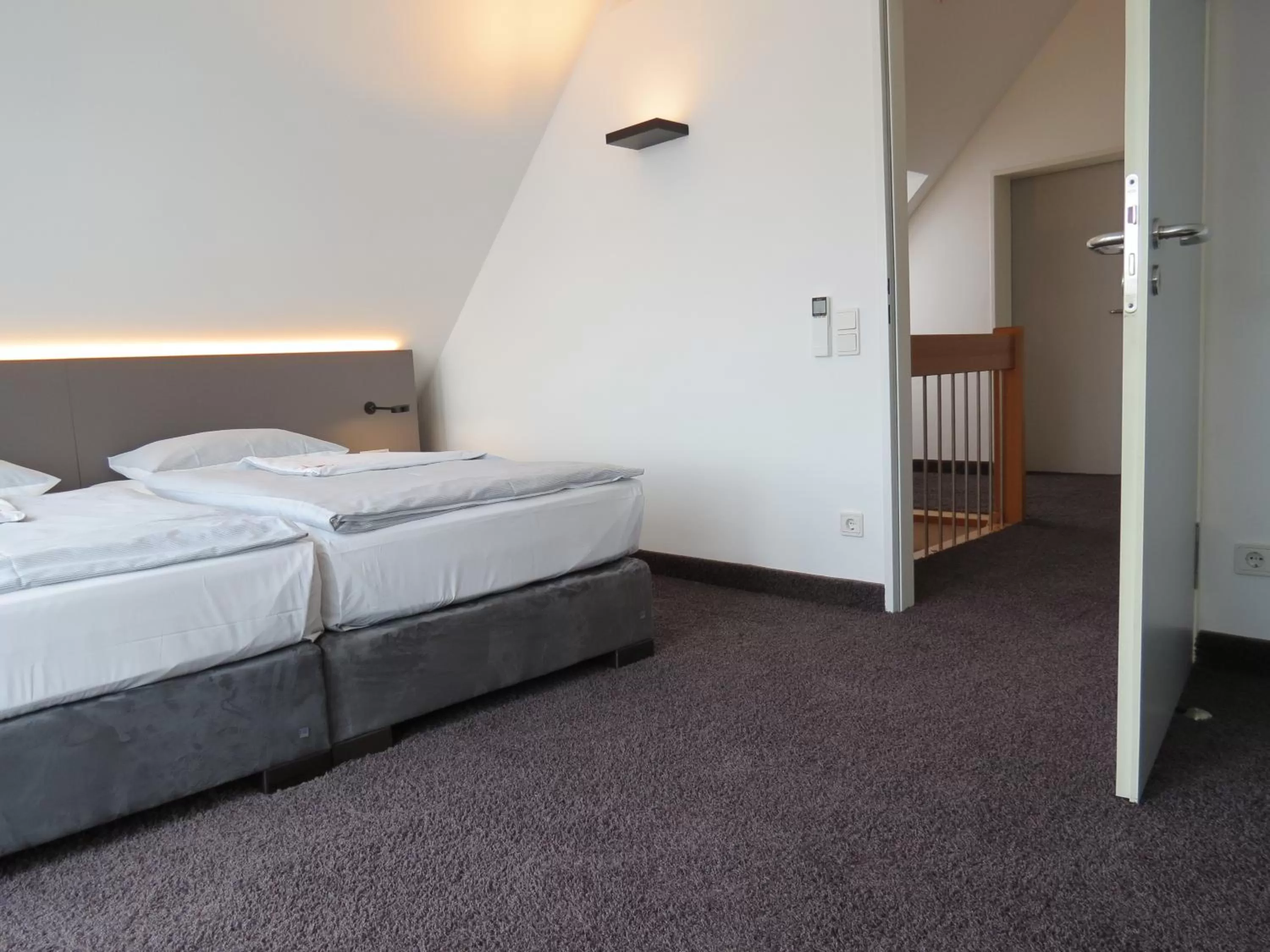 Photo of the whole room, Bed in Comfor Hotel Ulm City