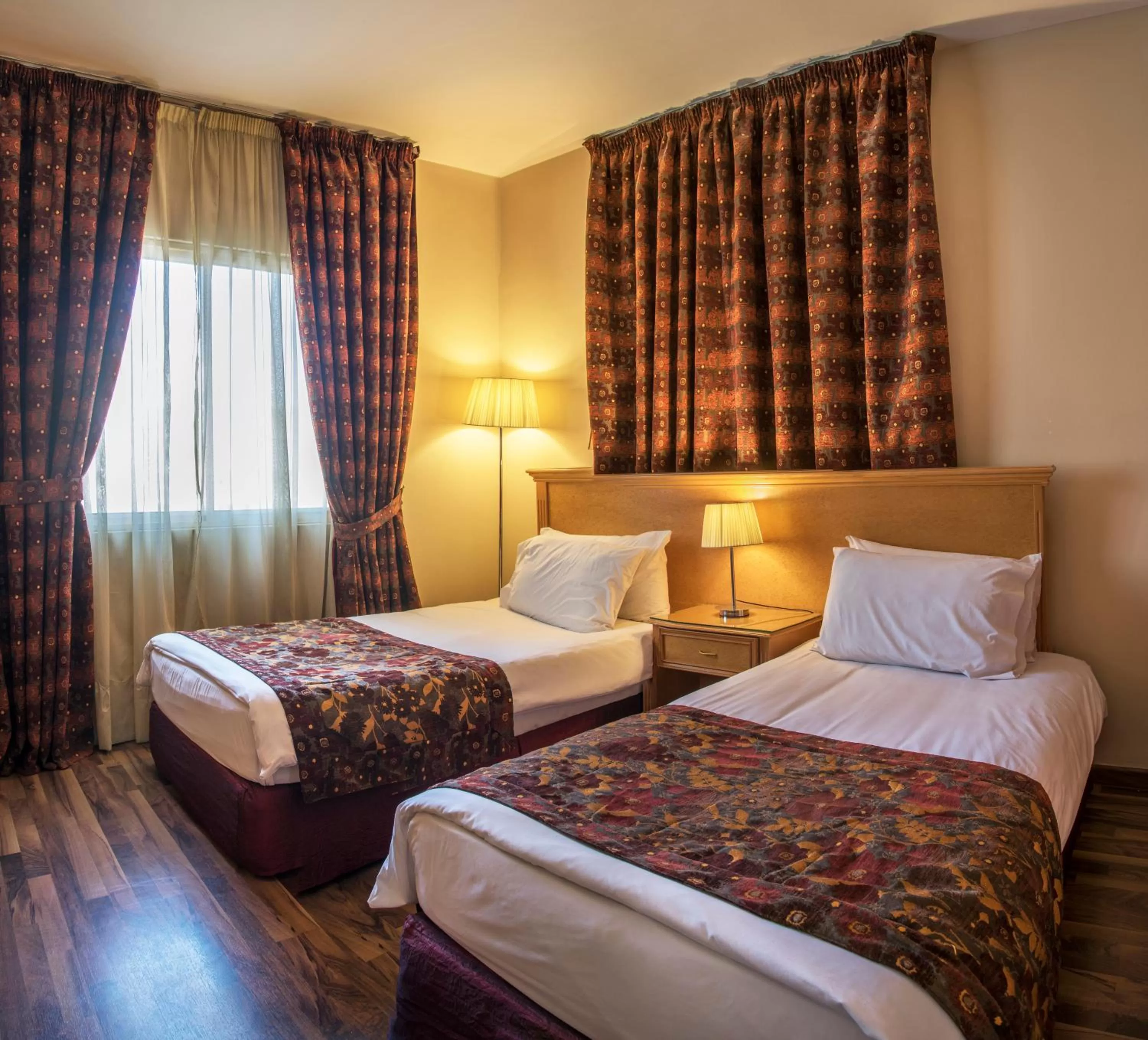 Bed in Bella Riva Hotel