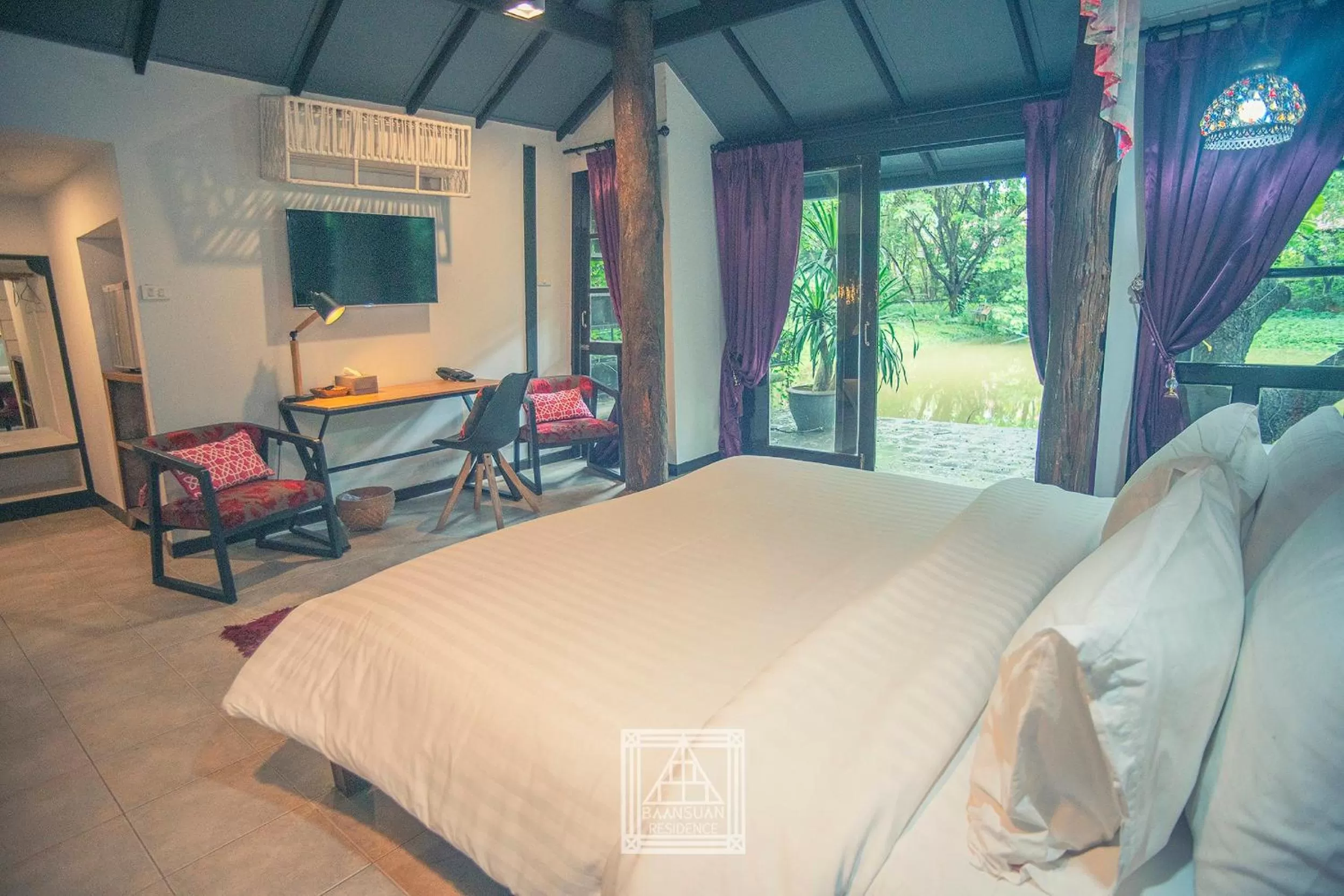 Photo of the whole room, Bed in Baan Suan Residence เฮือนพักบ้านสวน