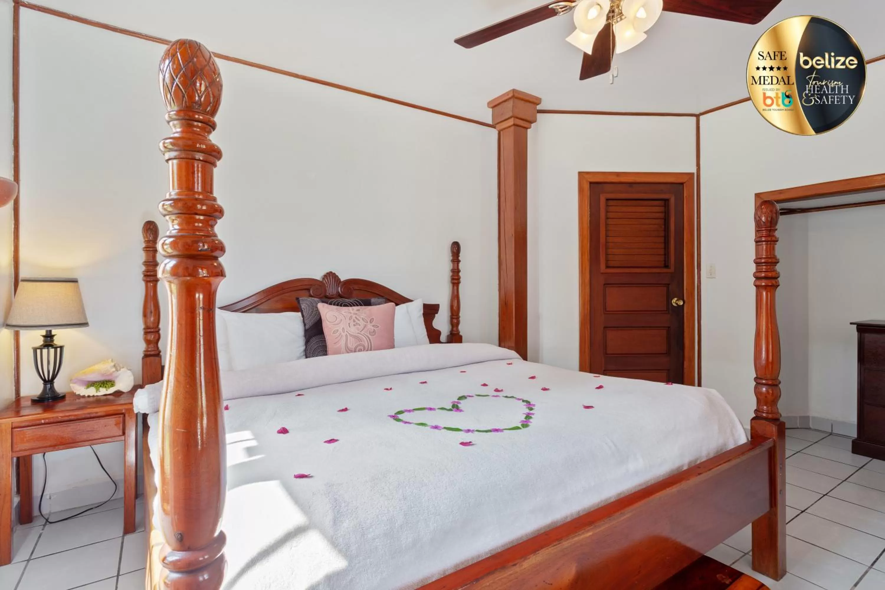 Bed in Portofino Beach Resort-An Authentic Island Escape!