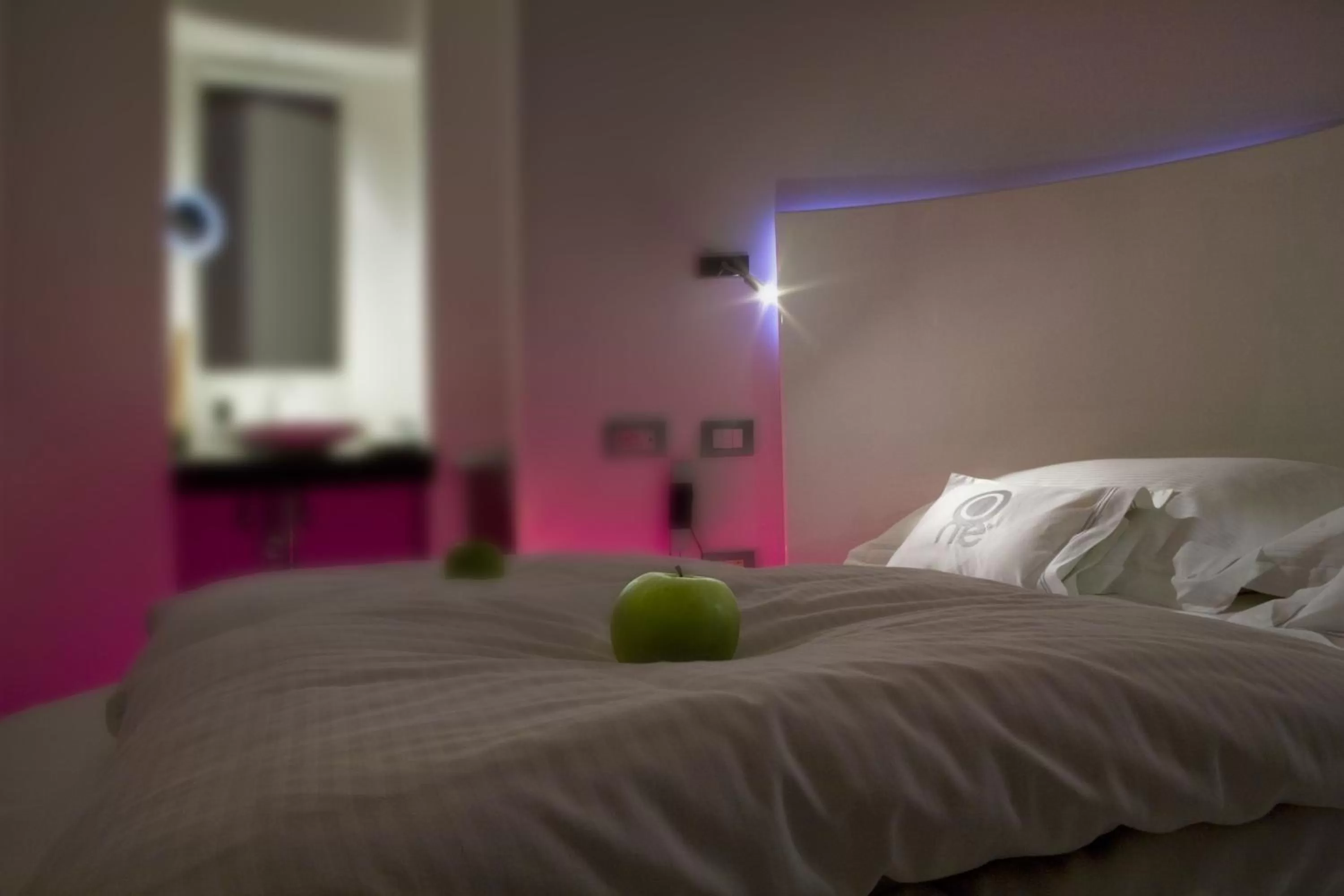 Bed in UNA HOTELS One Siracusa