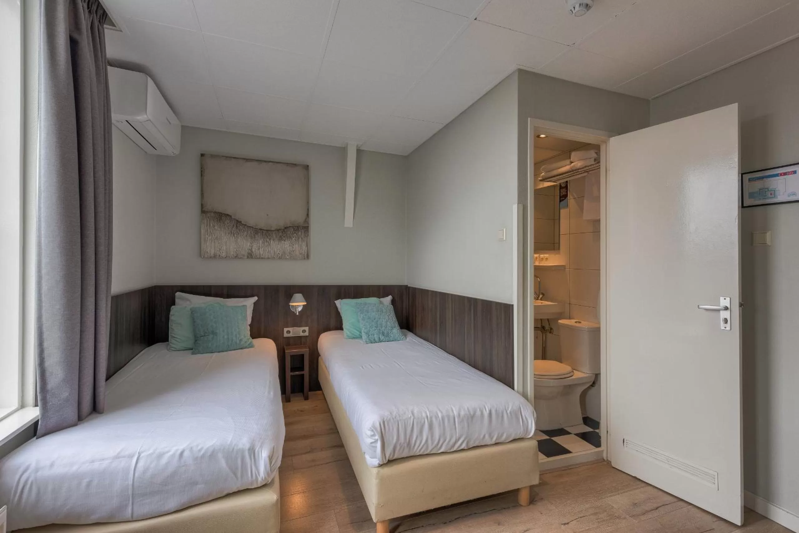 Bed in Hotel Damsquare