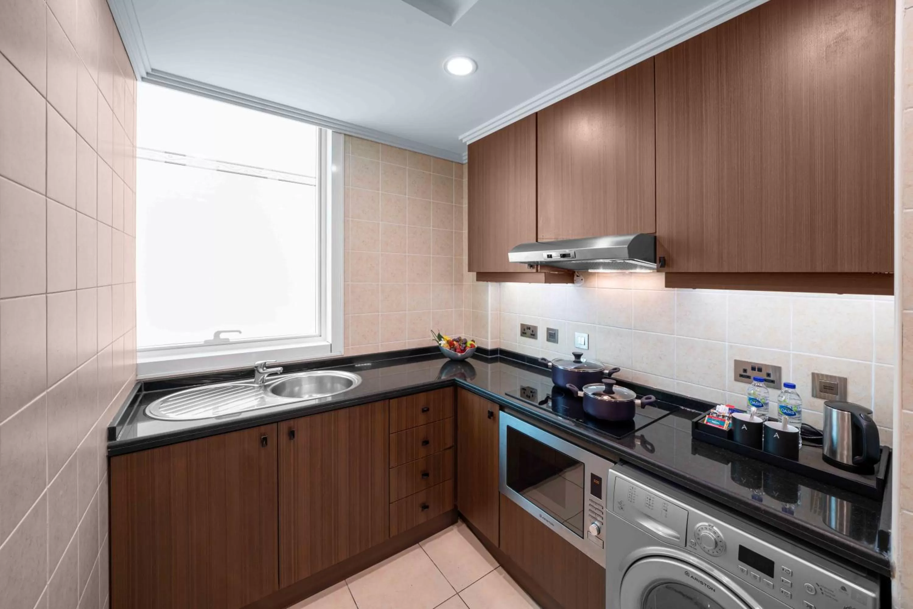 Kitchen or kitchenette in Al Maha Arjaan by Rotana