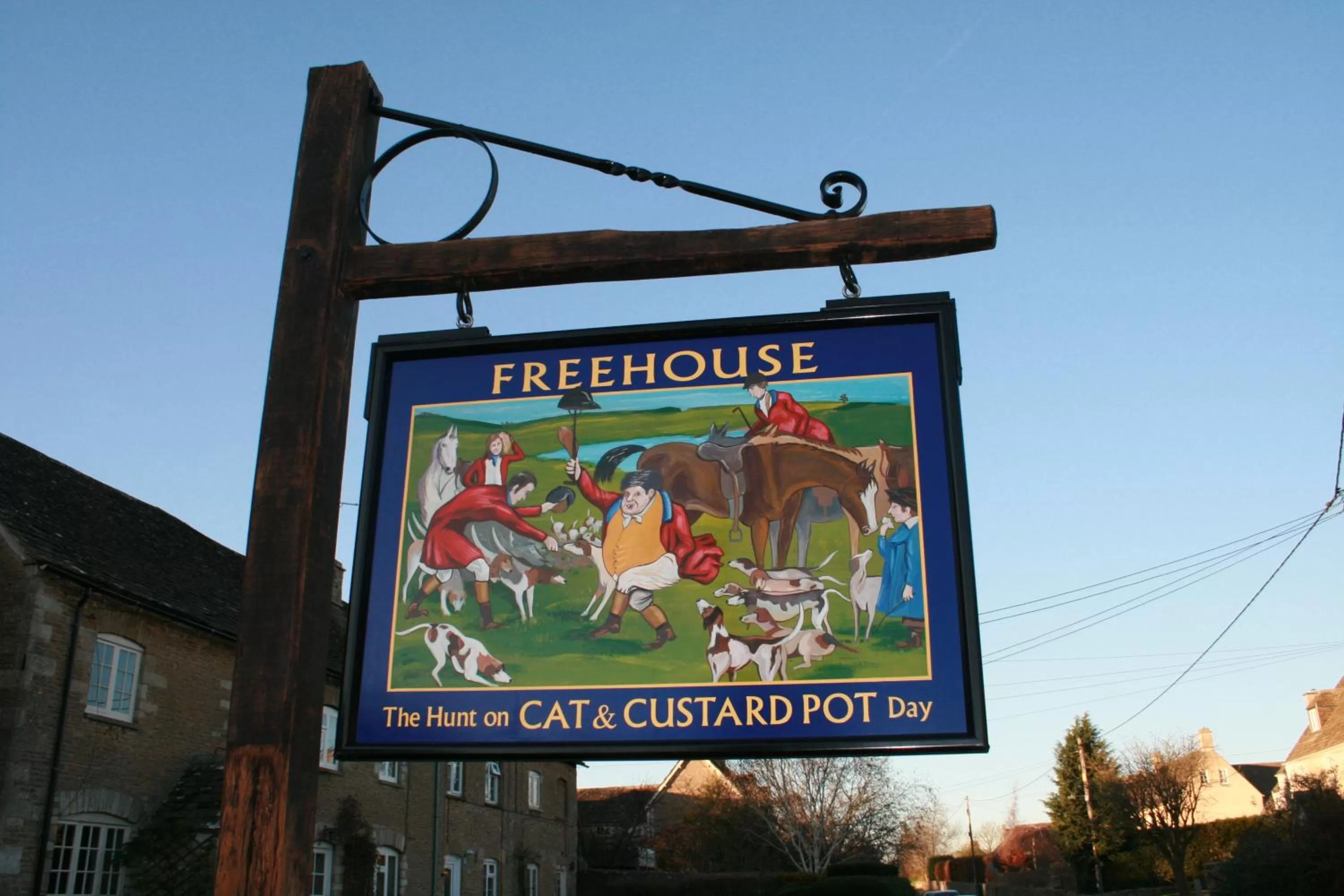 Property logo or sign in Cat and Custard Pot Inn