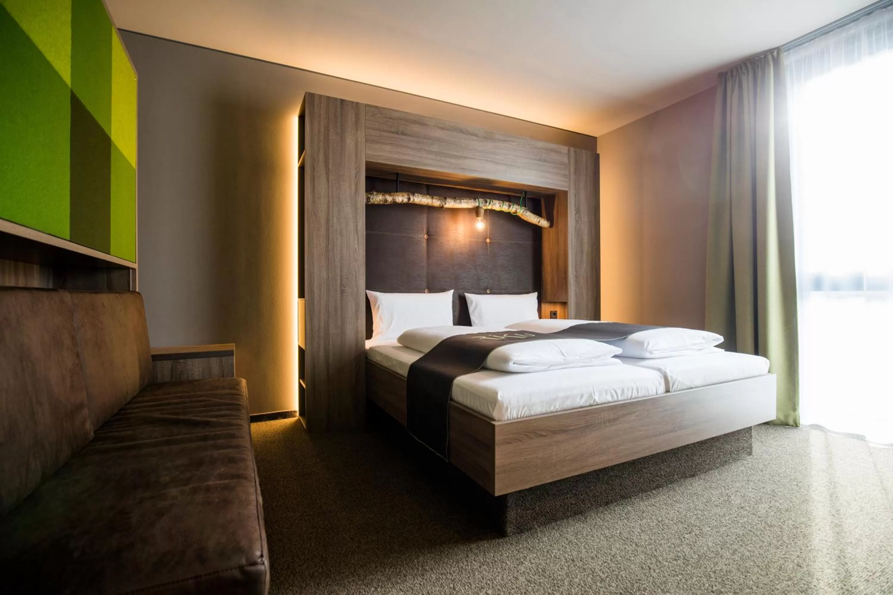 Photo of the whole room, Bed in RiKu HOTEL Pfullendorf