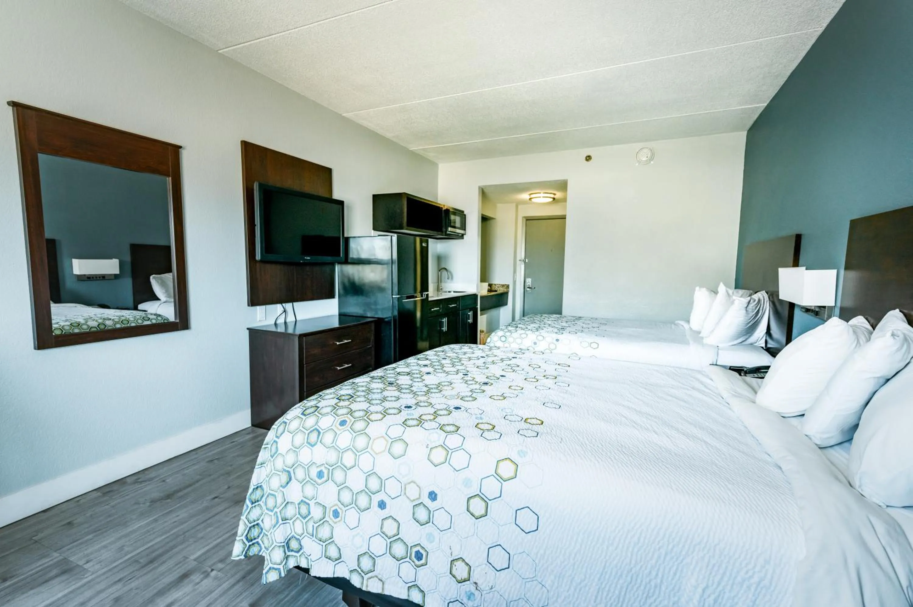 Photo of the whole room, Bed in HomeTowne Studios by Red Roof San Antonio - SeaWorld Northwest