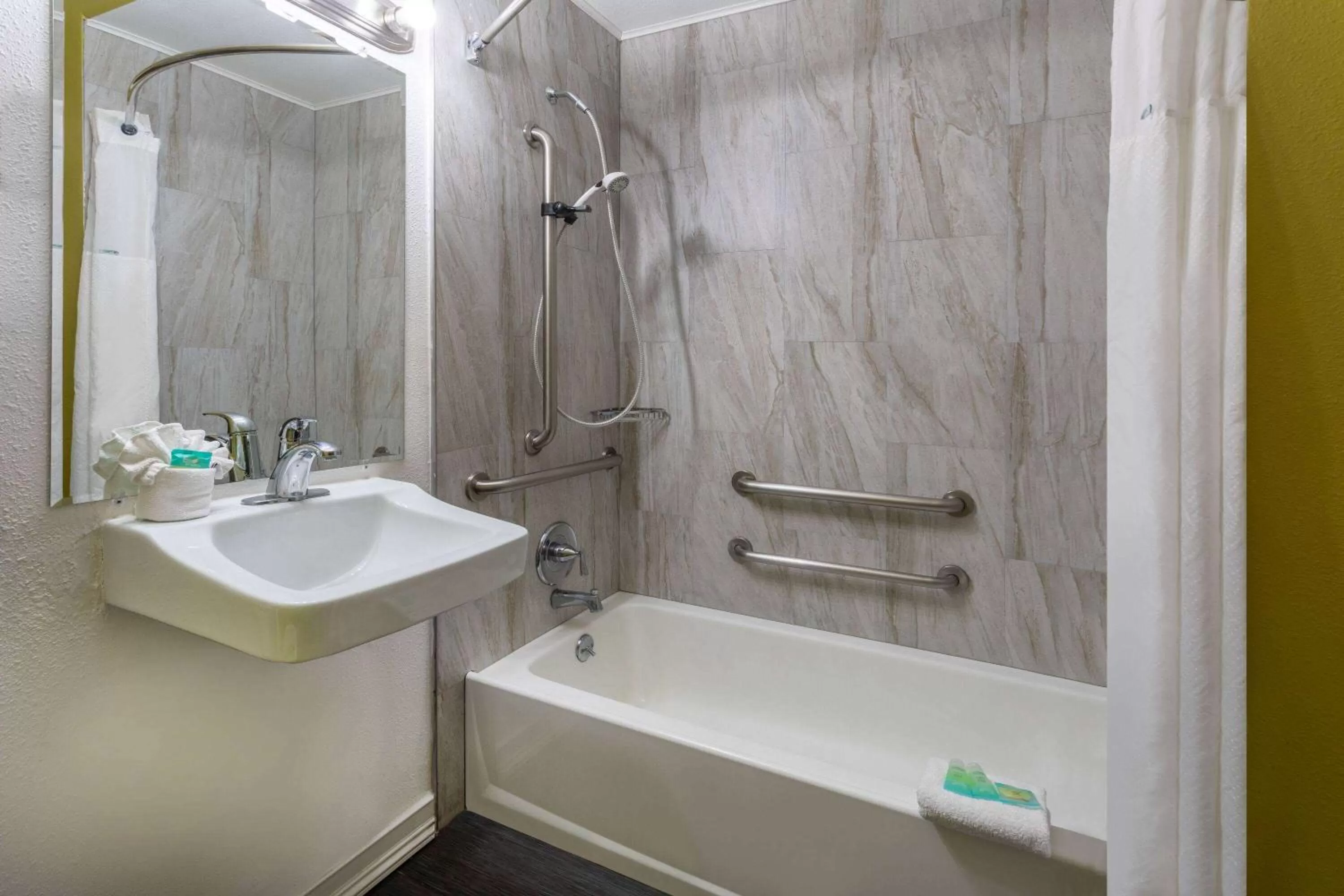 Bathroom in Super 8 by Wyndham NAU/Downtown Conference Center