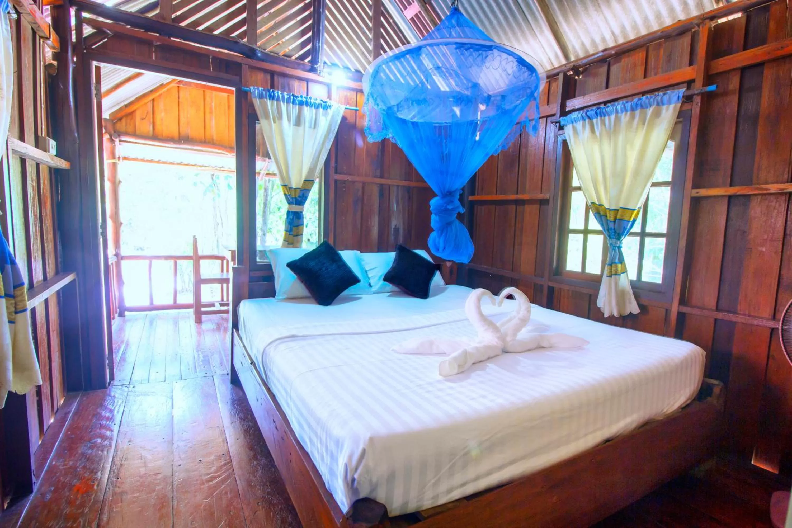 Bed in Khao Sok Palmview Resort