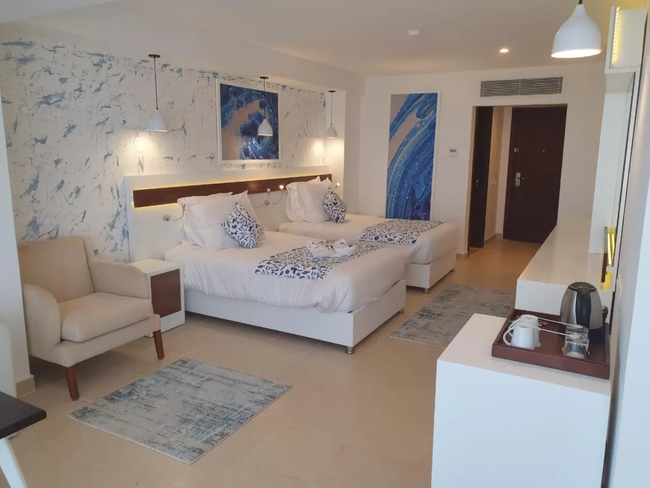 Photo of the whole room, Bed in Coral Sun Beach