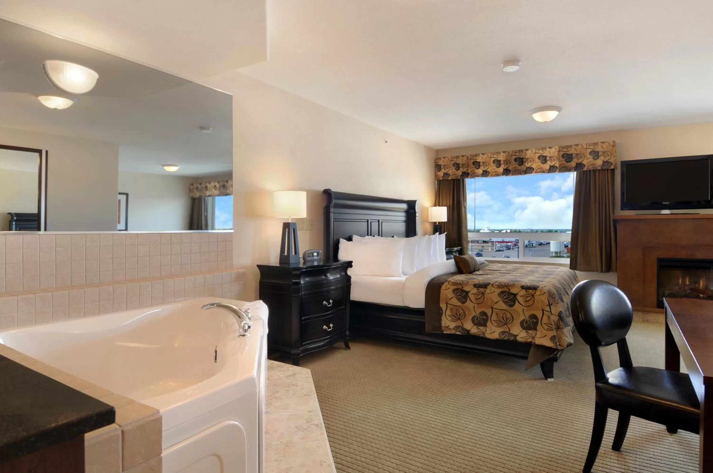 Bed in Ramada by Wyndham Wainwright