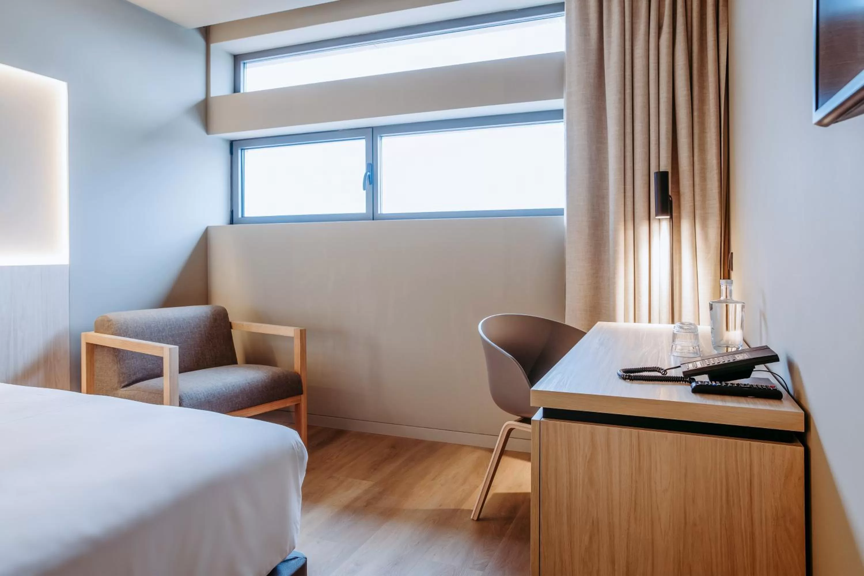 Seating area, Bed in Mercure Fátima