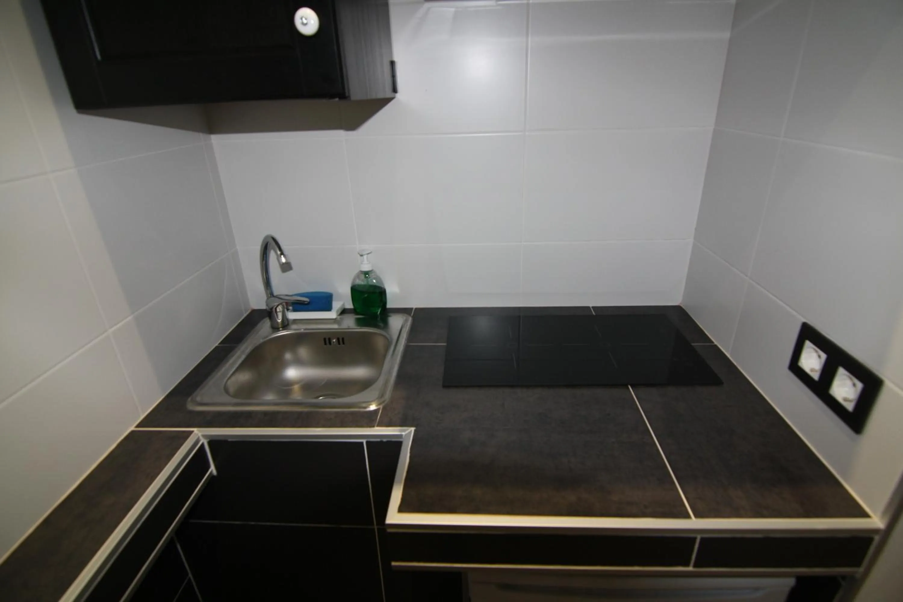 Kitchen or kitchenette in Hostal MH Fuencarral