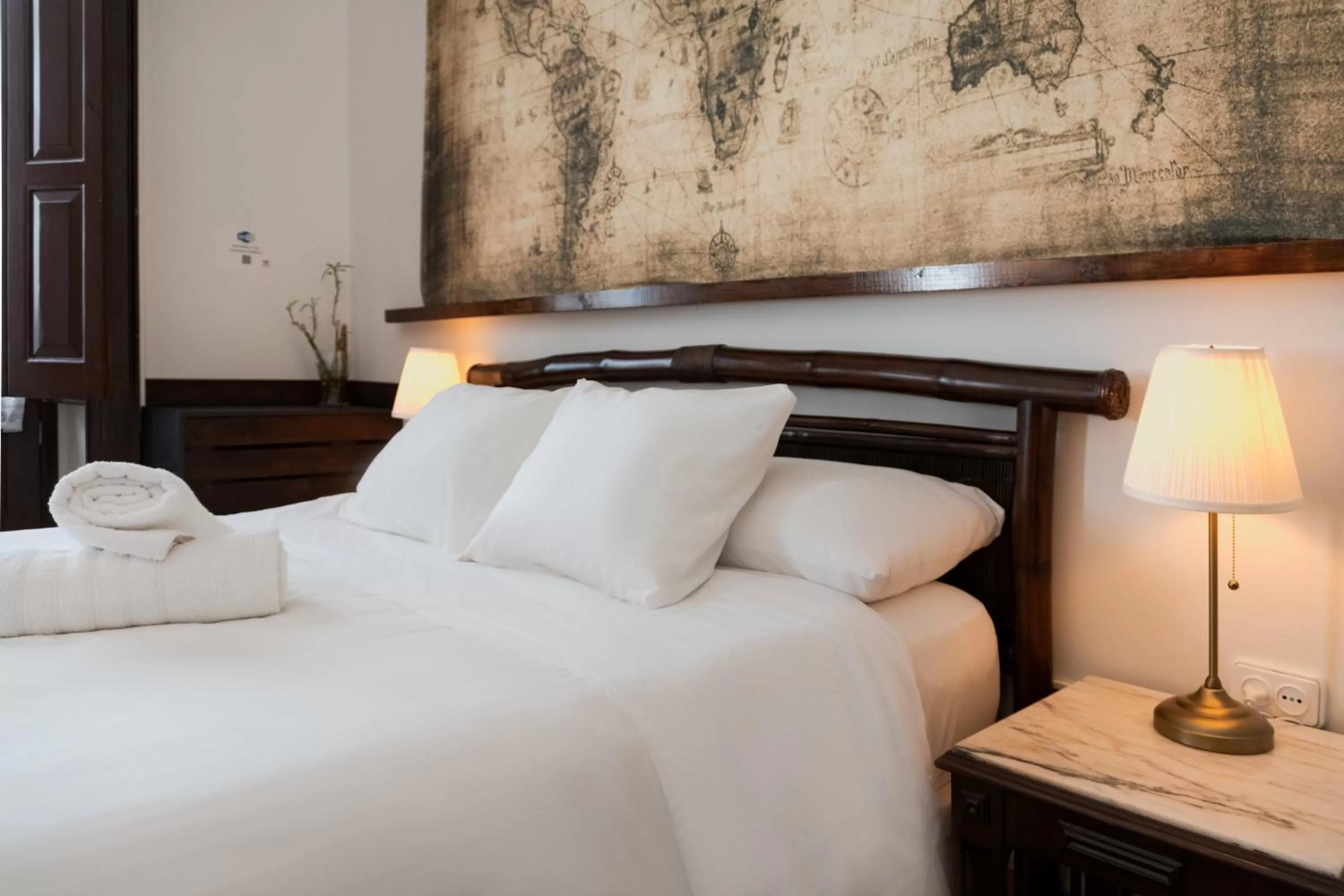 Bed in Santa Ana Suite & Rooms