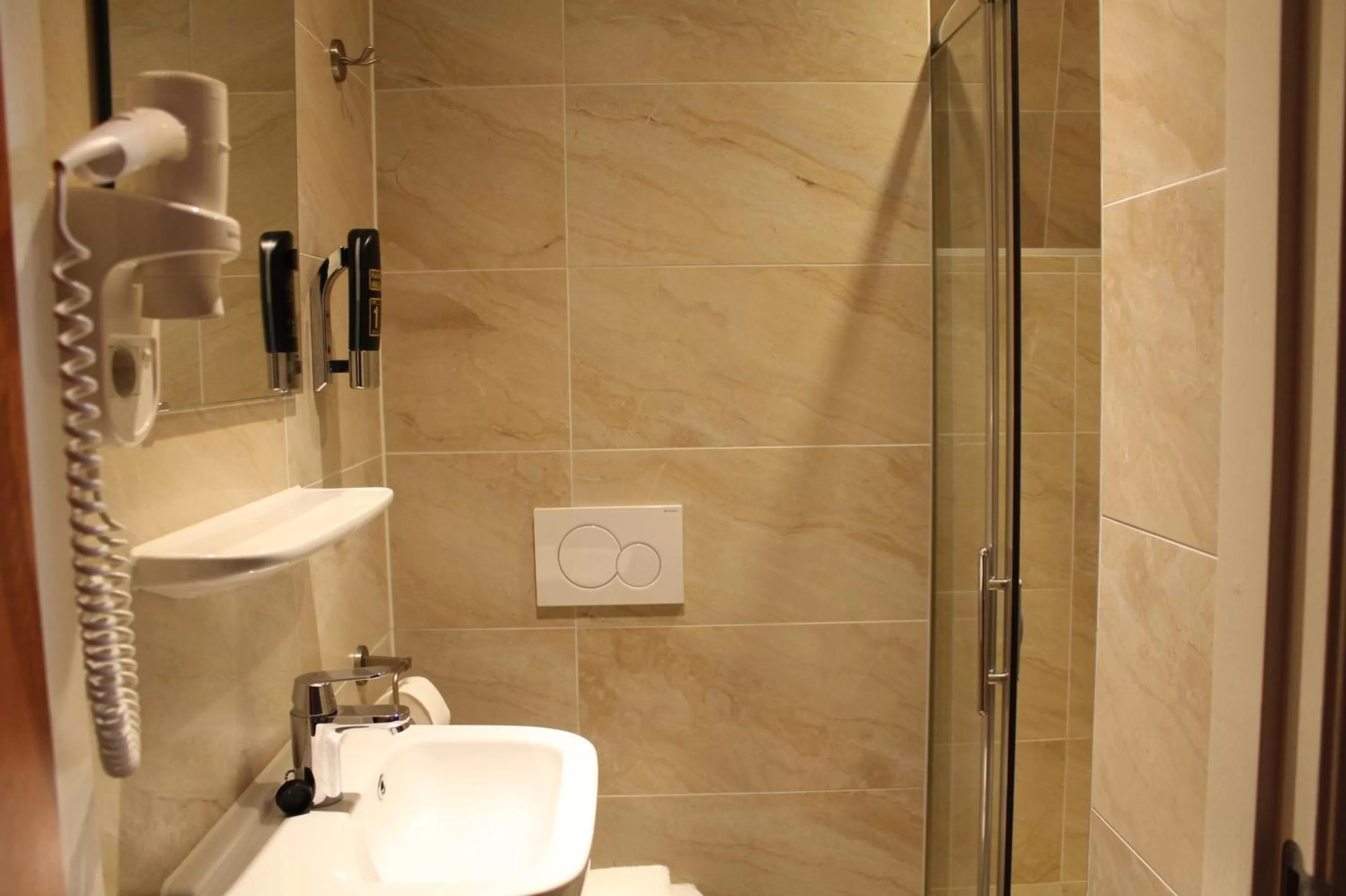 Bathroom in Blossoms City Hotel