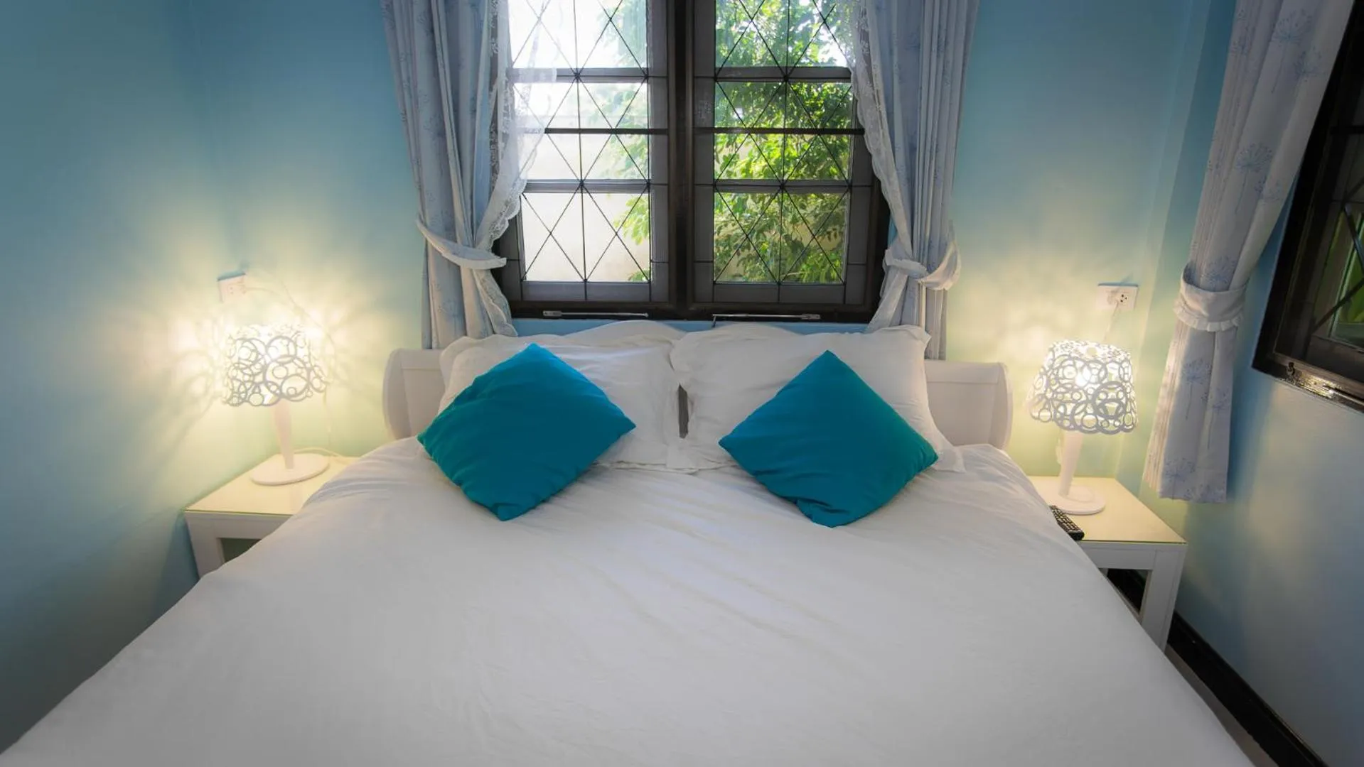 Bed in Thararin Villa