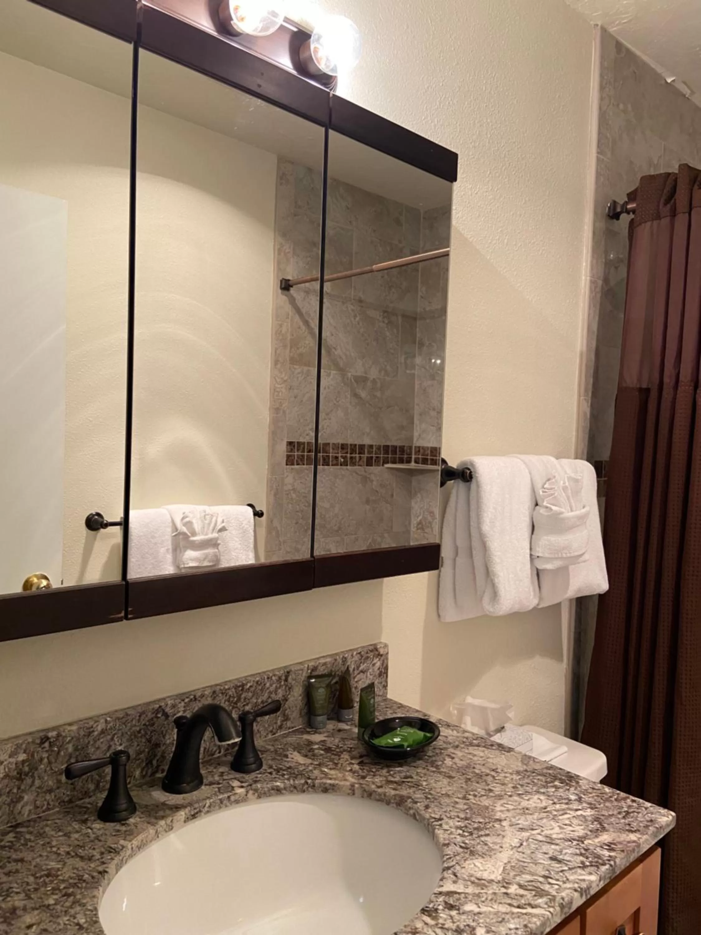 Bathroom in GetAways at Park Regency Resort