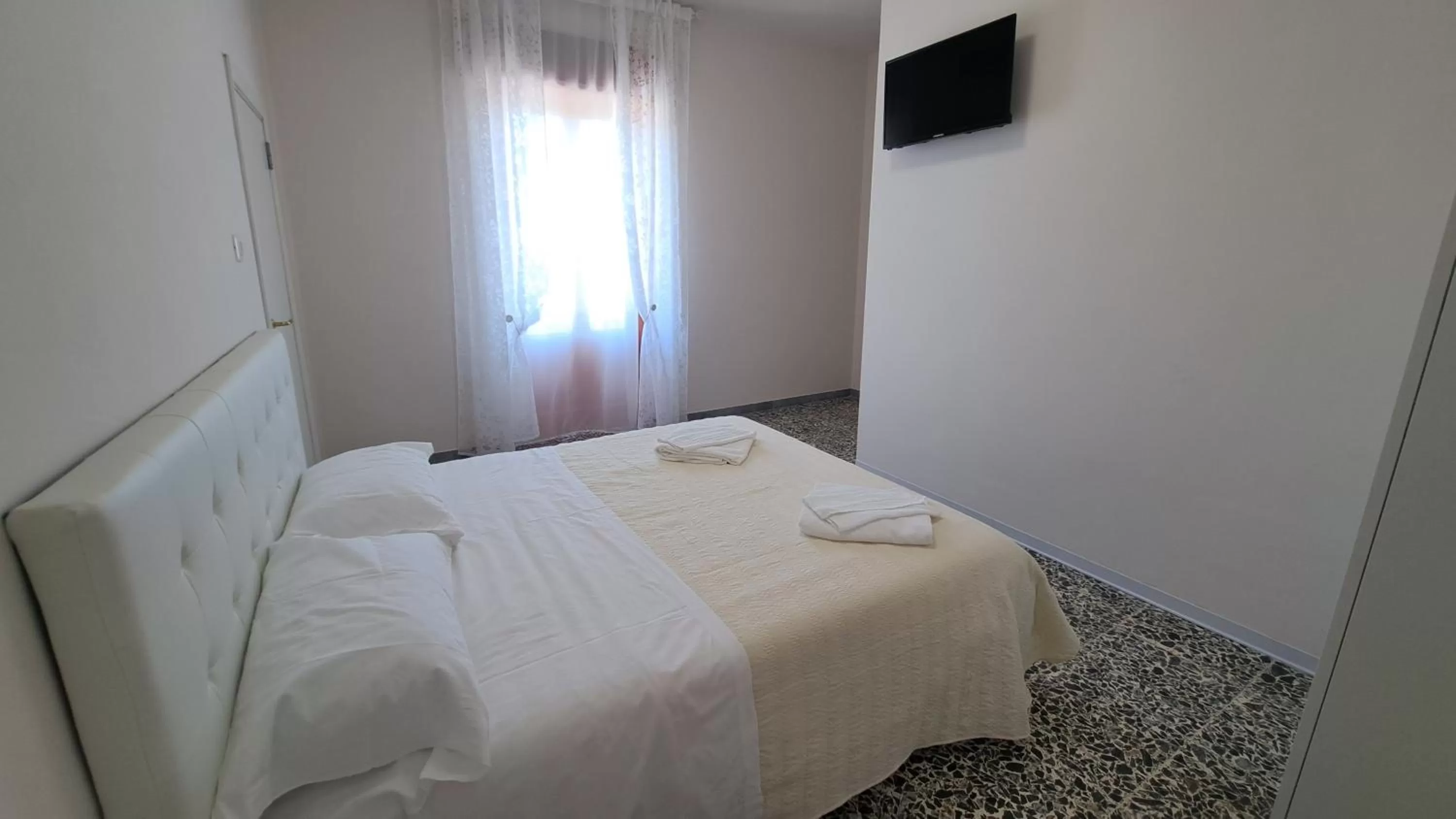 Bed in B & B le tre rose