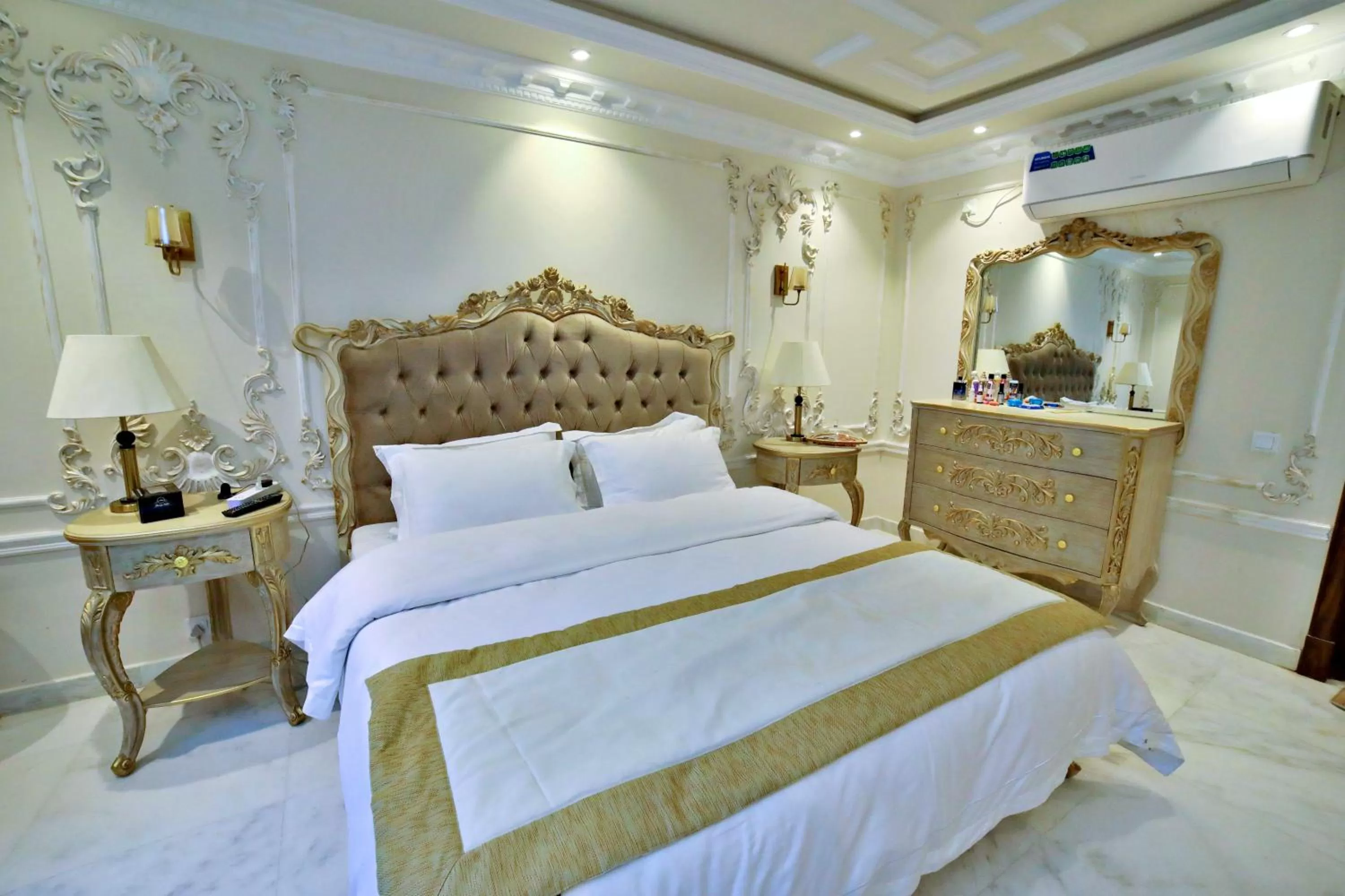 Bed in Arish Luxury Suites