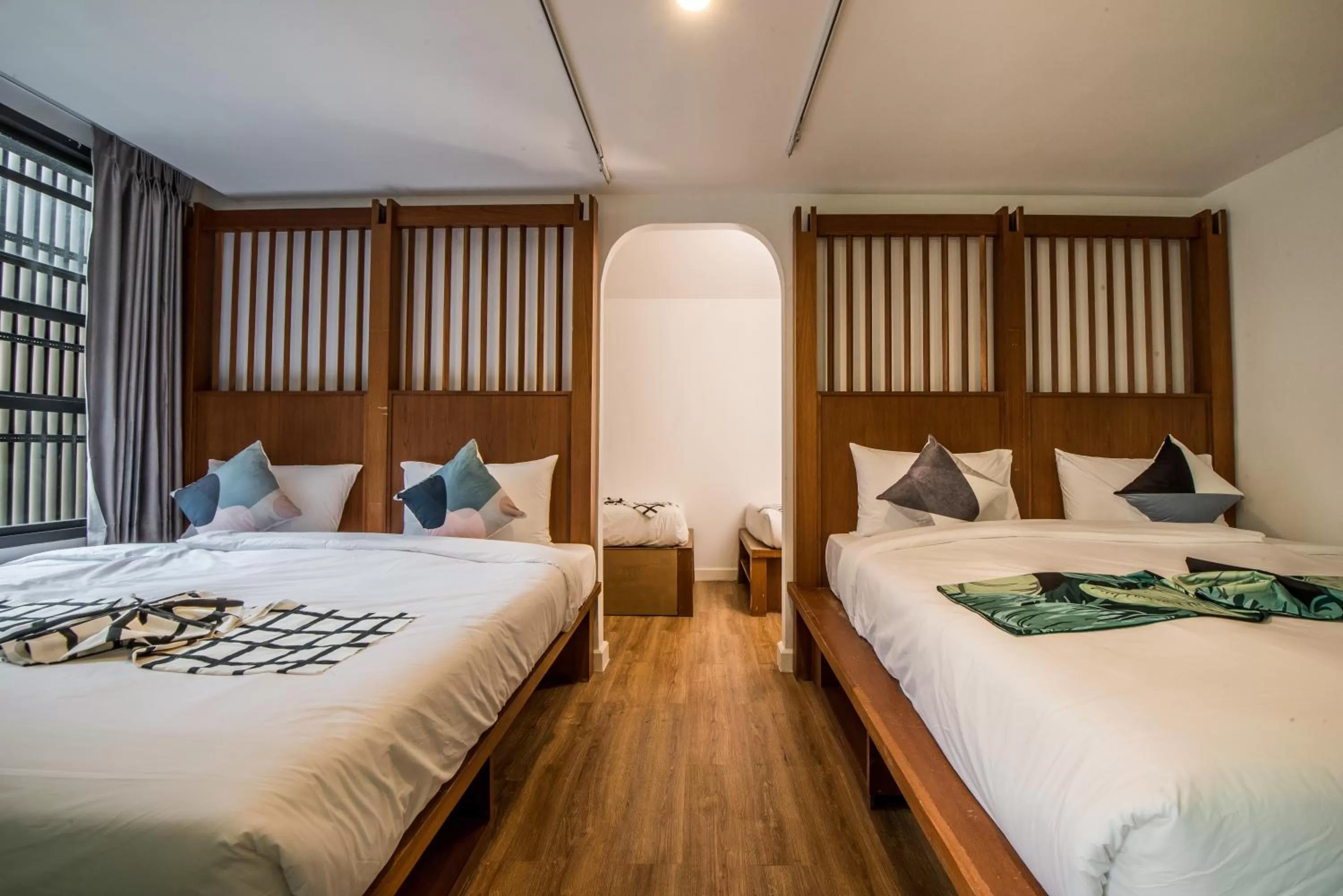 Bed in Nimit Boutique Hotel