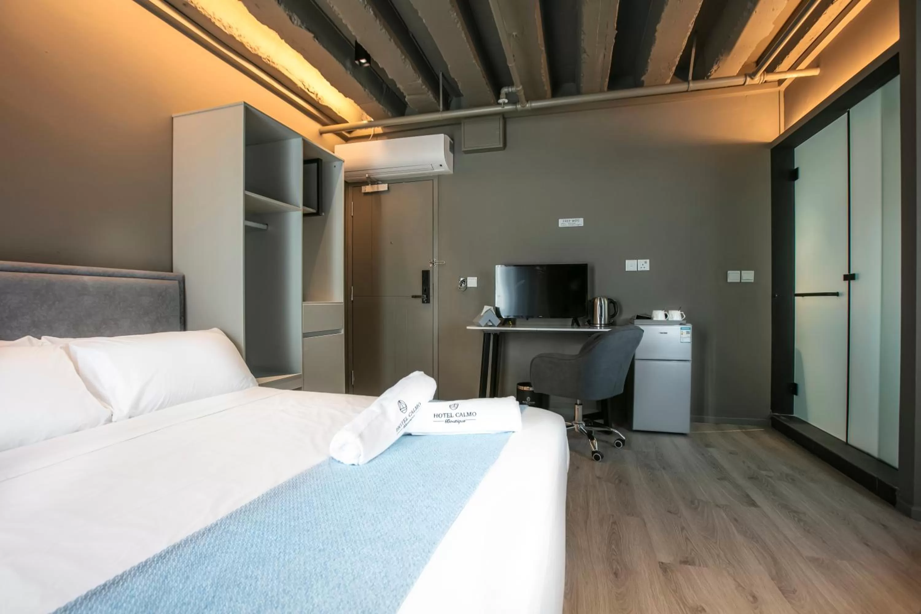 Bed in Hotel Calmo Bugis