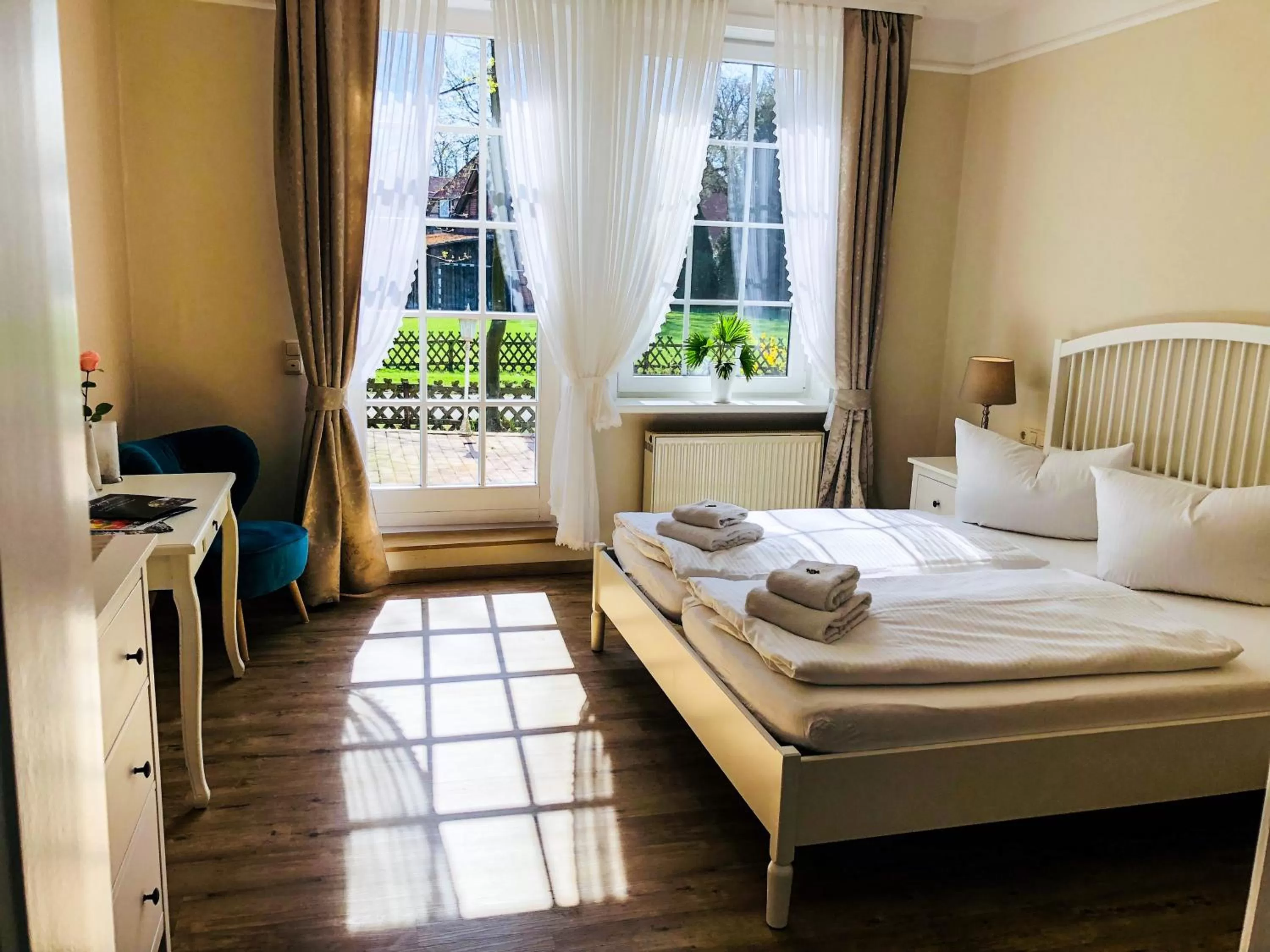 Photo of the whole room, Bed in Landhotel Gutshof im Oertzetal in Oldendorf, Südheide