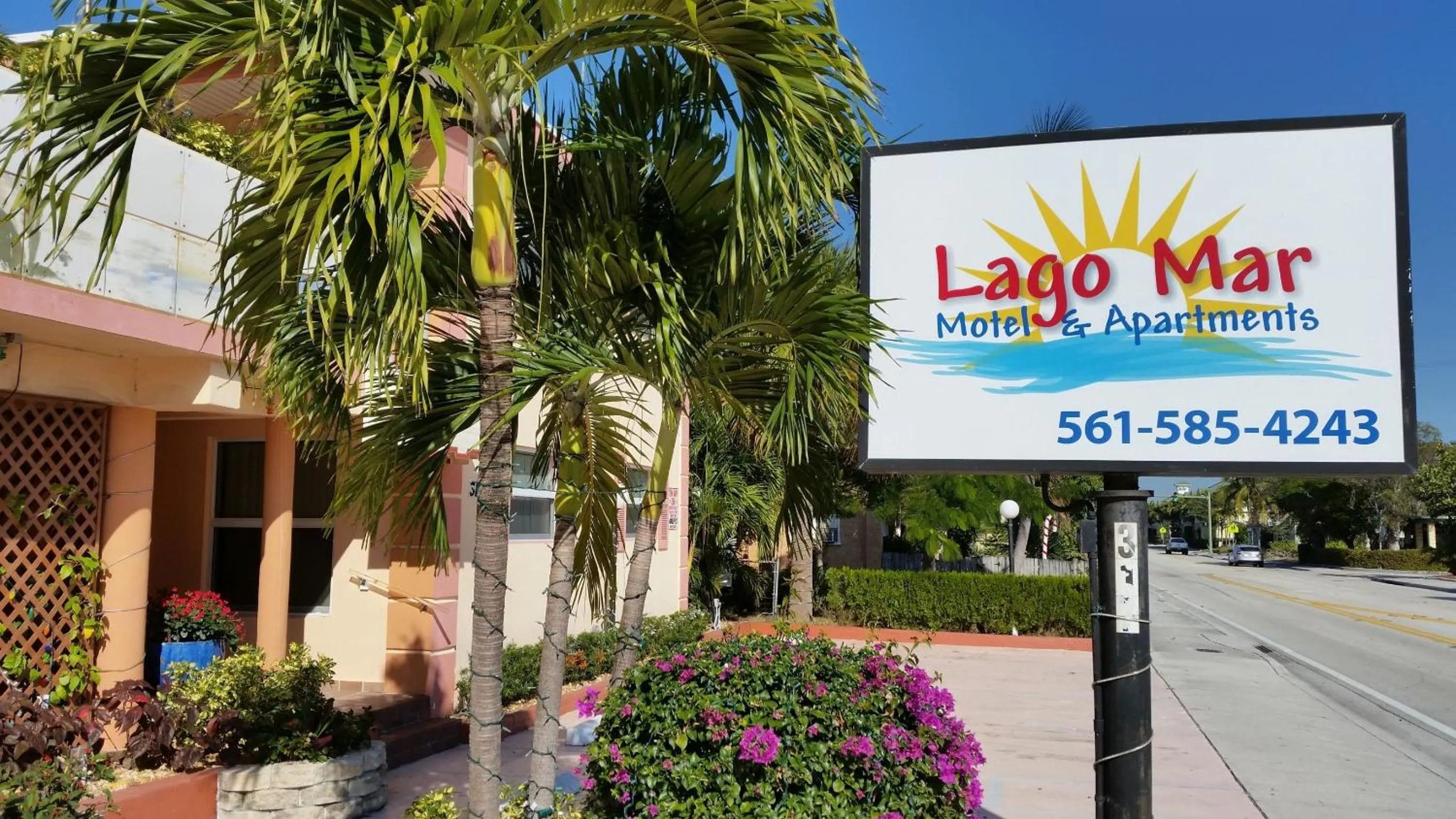 Property logo or sign in Lago Mar Motel and Apartments