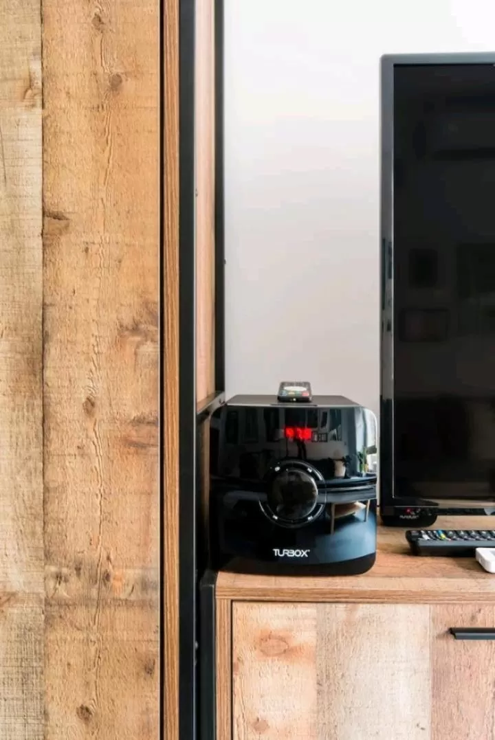 TV/Entertainment Center in Explore a New Arts District from a Hip Studio Flat