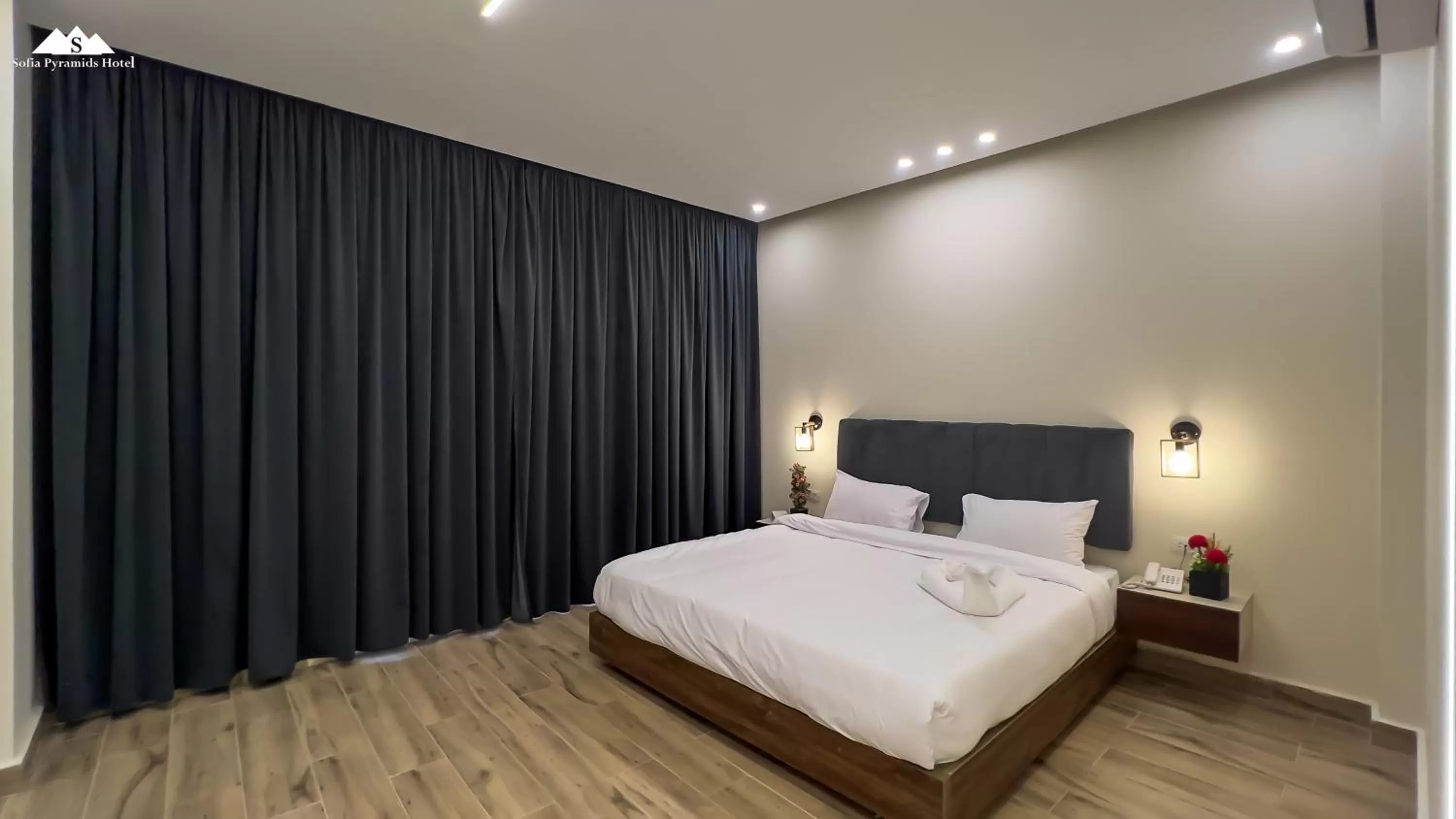 Bed in Sofia Pyramids Hotel