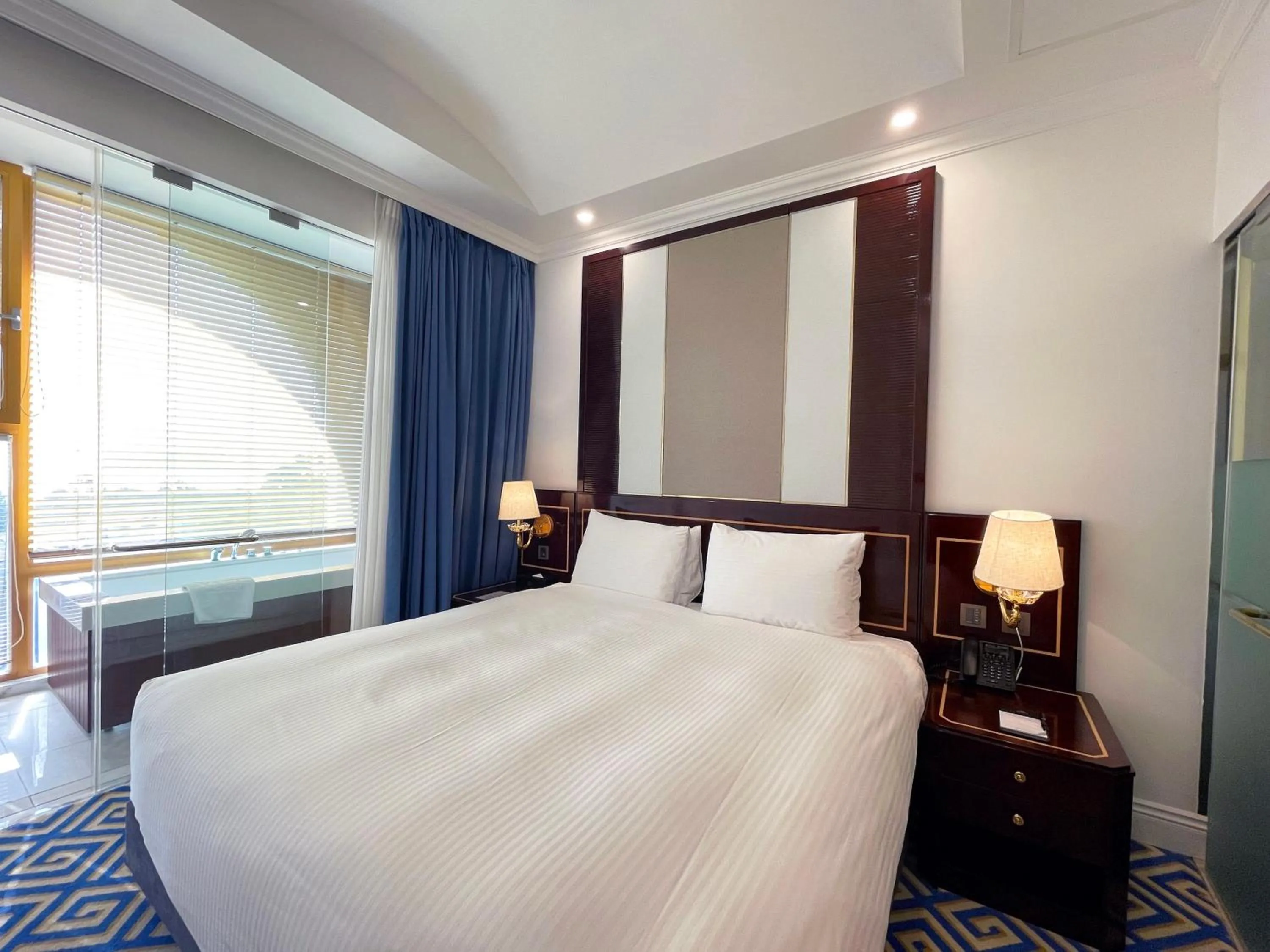 Photo of the whole room, Bed in GoldOne Hotel & Suites