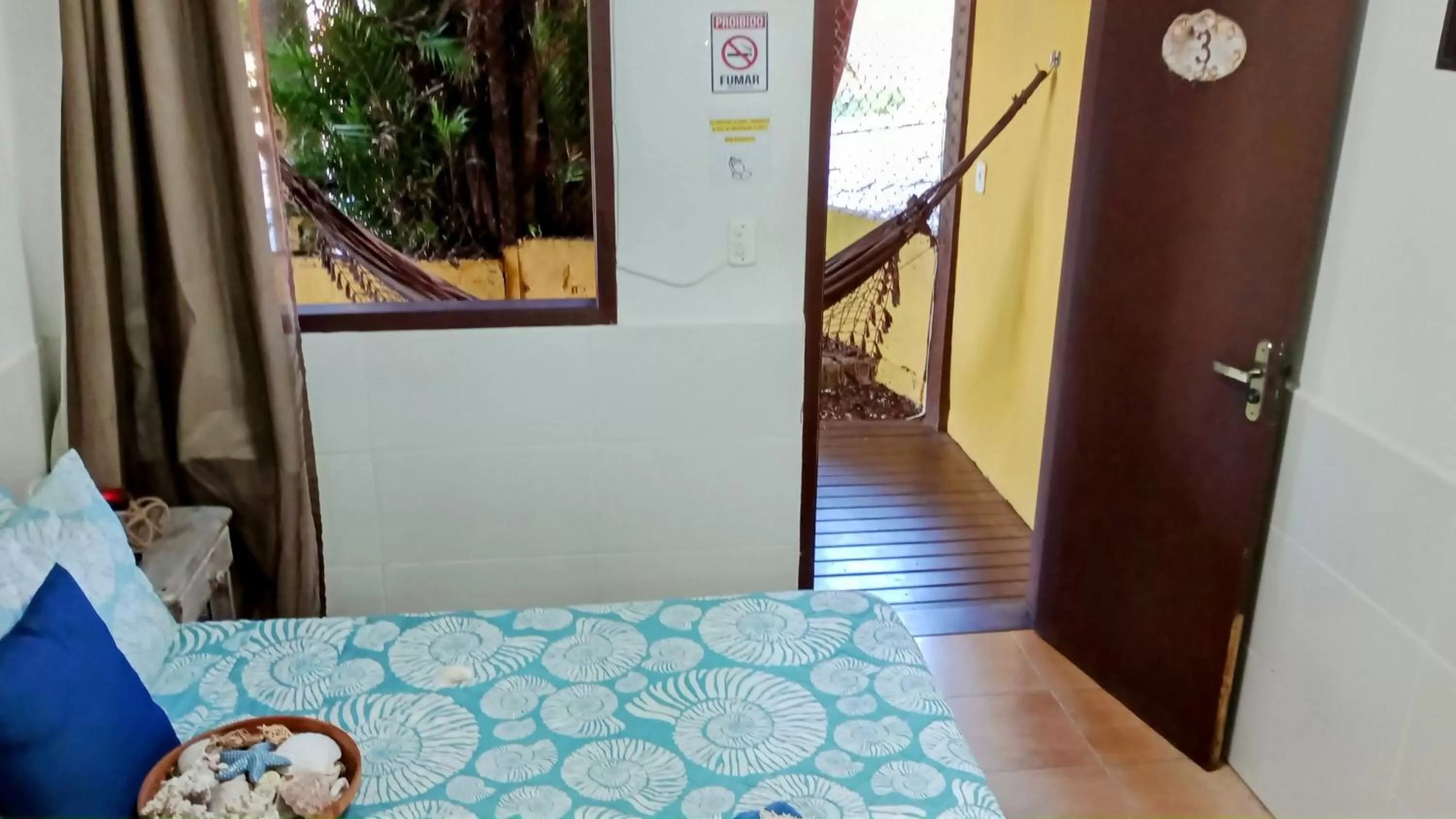 Bed in Hibiscos Pousada