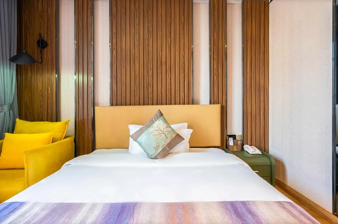 Bedroom in Guangzhou Nuomo International Hotel-Canton Fair Free Shuttle Bus