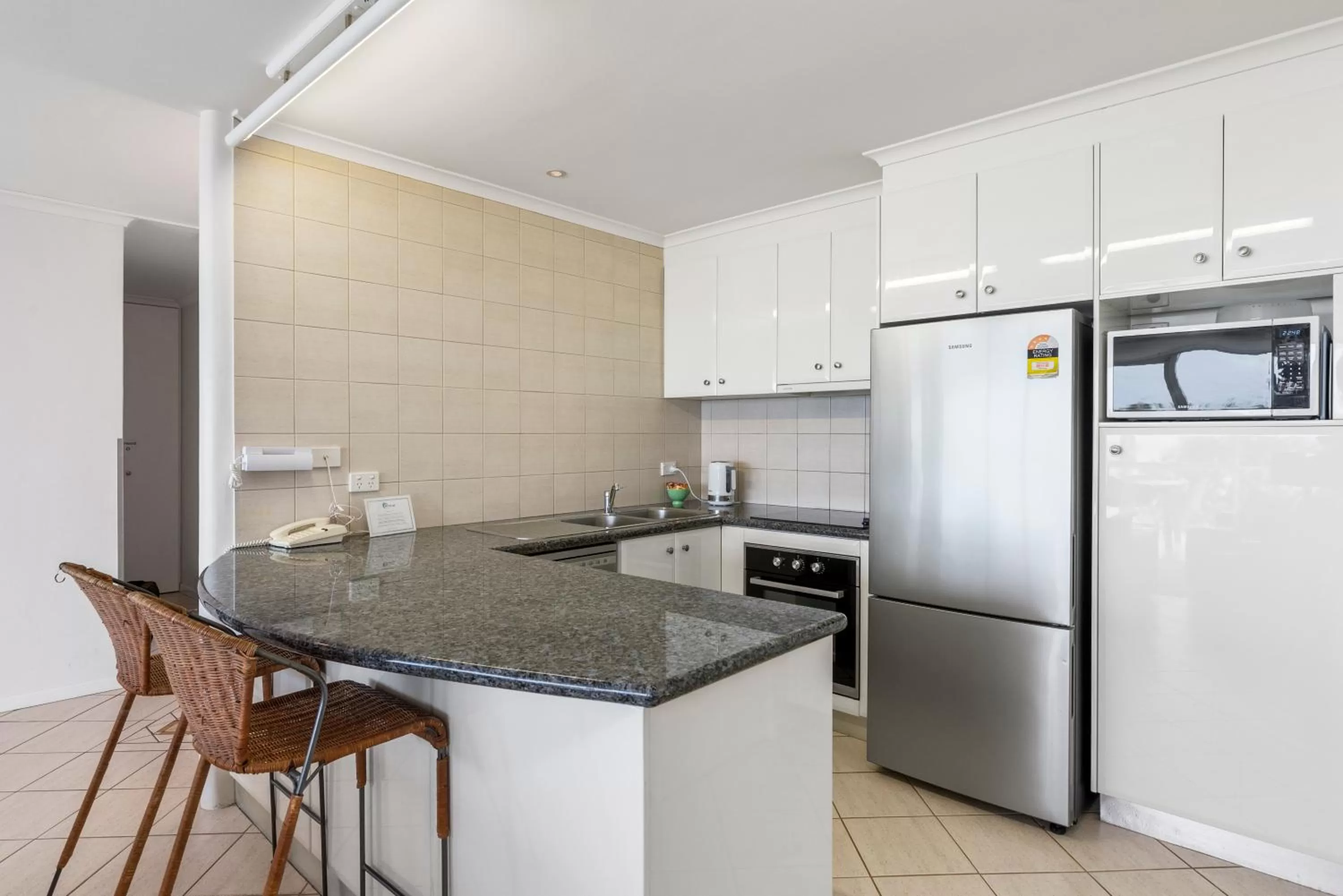 Kitchen or kitchenette in 84 The Spit Holiday Apartments