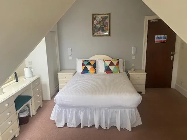 Bed in Runnymede Court Hotel