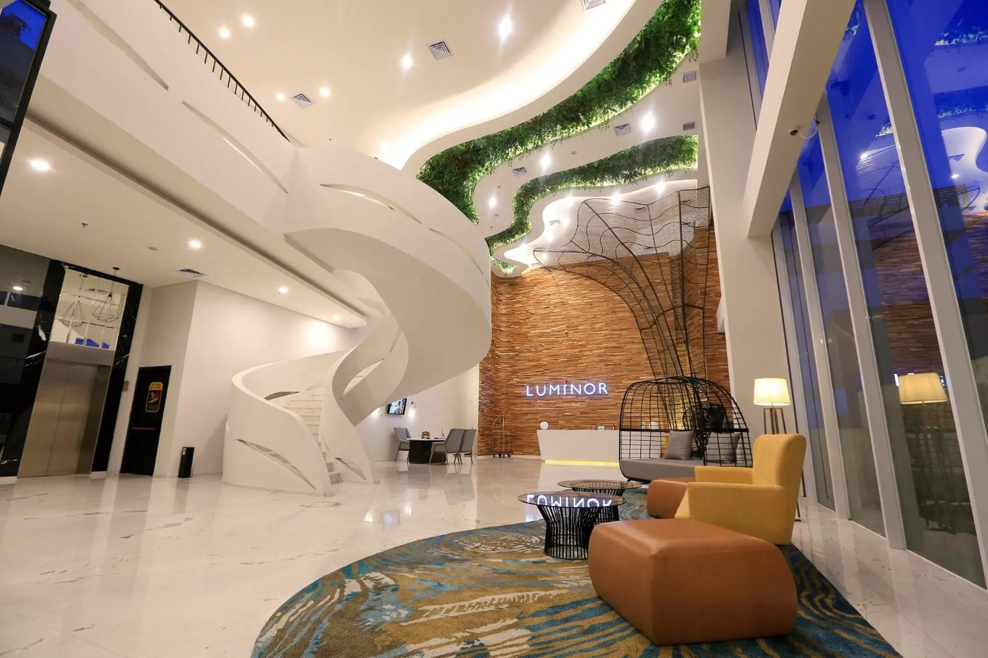 Lobby or reception in Luminor Hotel Purwokerto By WH