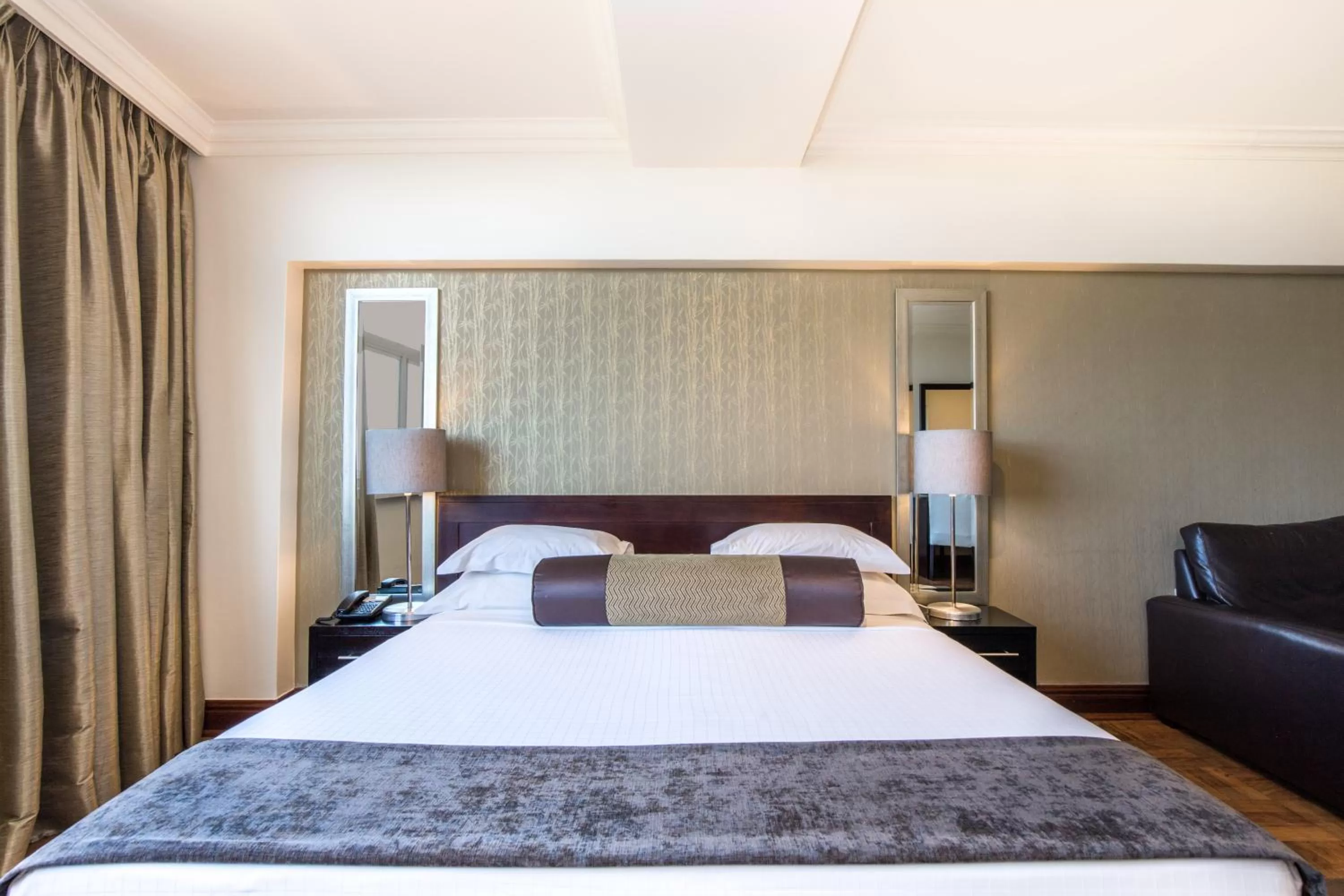 Bedroom, Bed in Belaire Suites Hotel