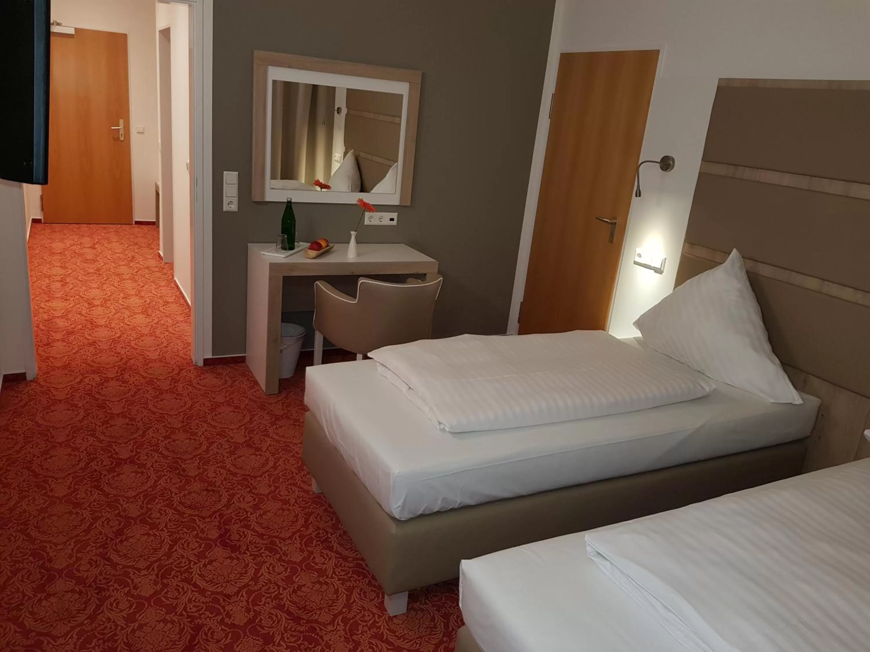 Bed in Confour Hotel