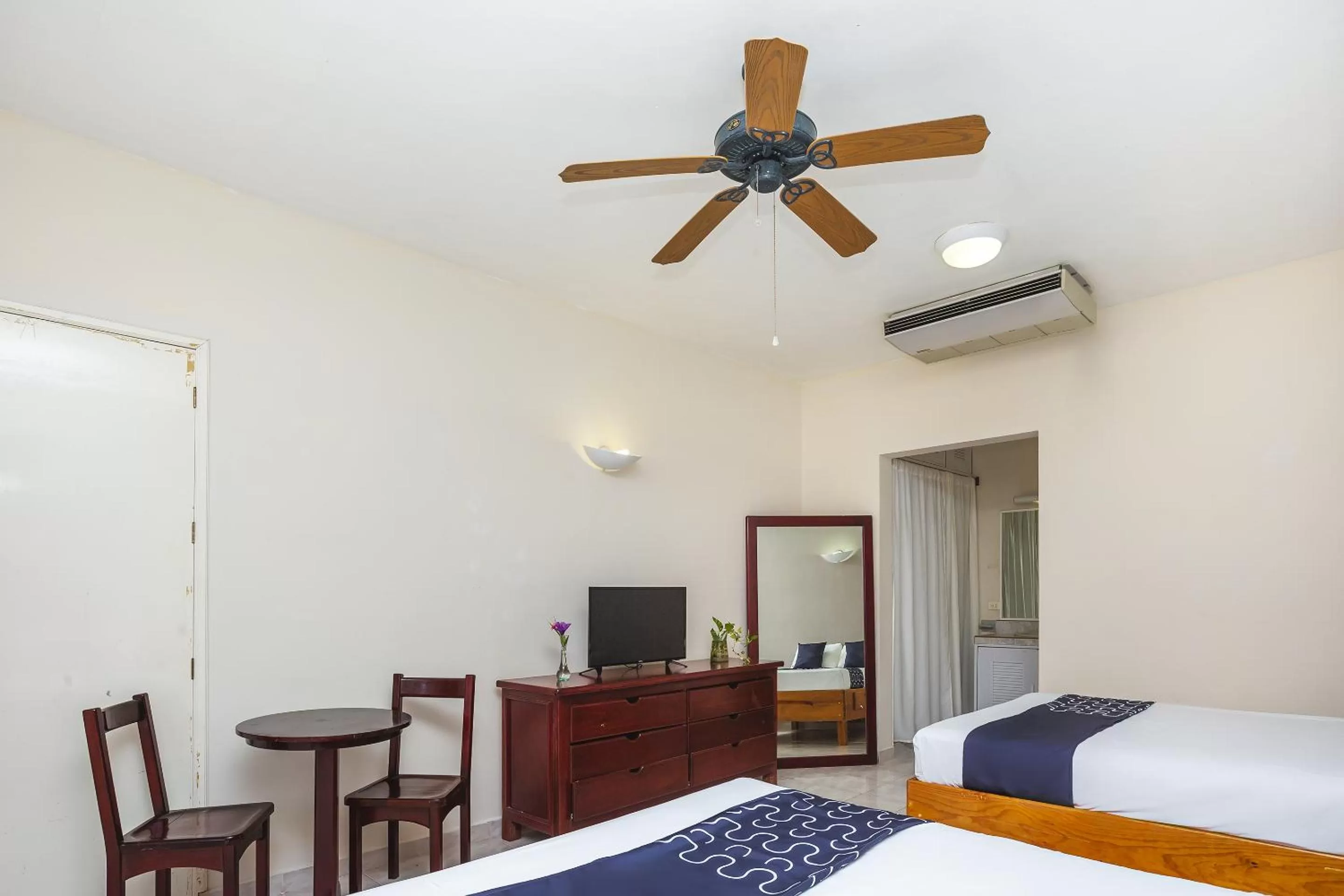 Bed in Hotel Kiin Cozumel