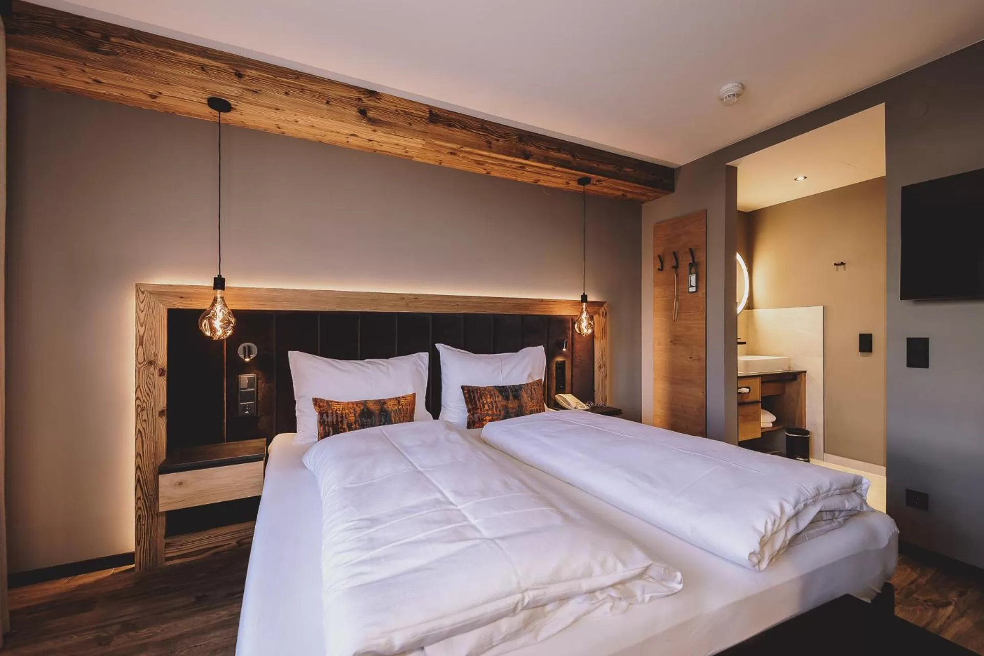 Bedroom, Bed in POST POST Hotel - Alpine Boutique Hotel & Spa