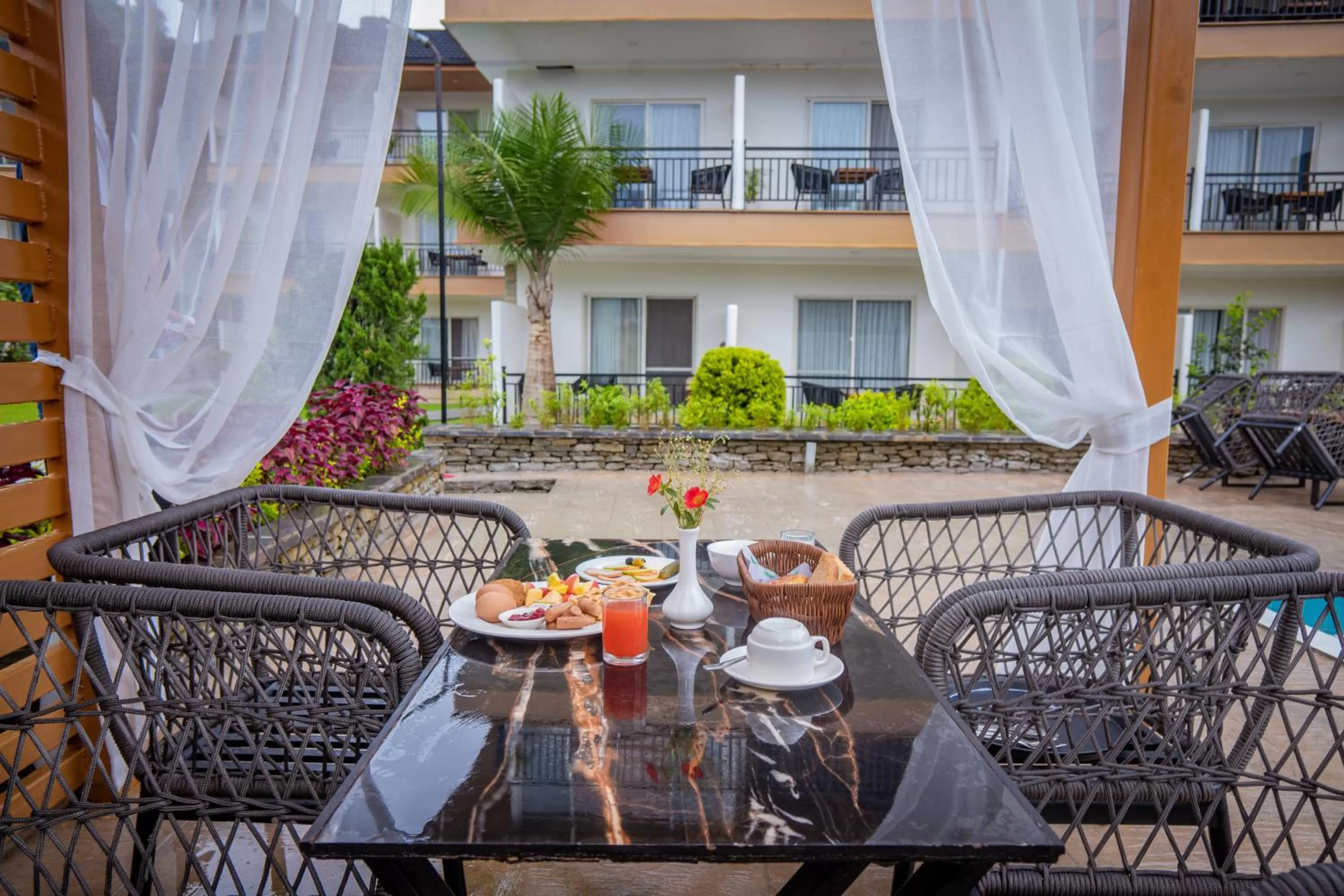 Breakfast in Majestic Lake Front Hotel & Suites