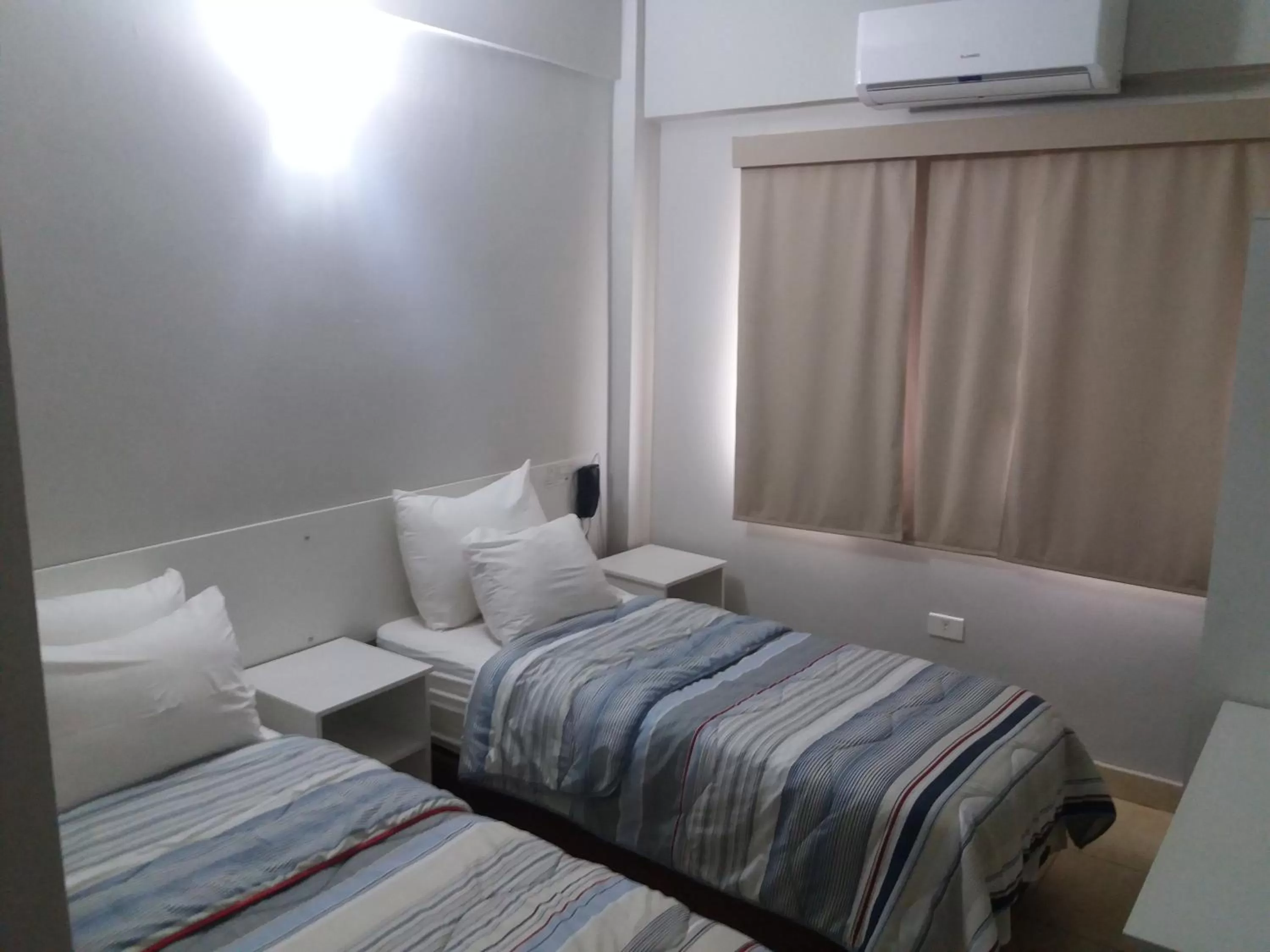 Bed in Madame Lynch Hotel Asuncion