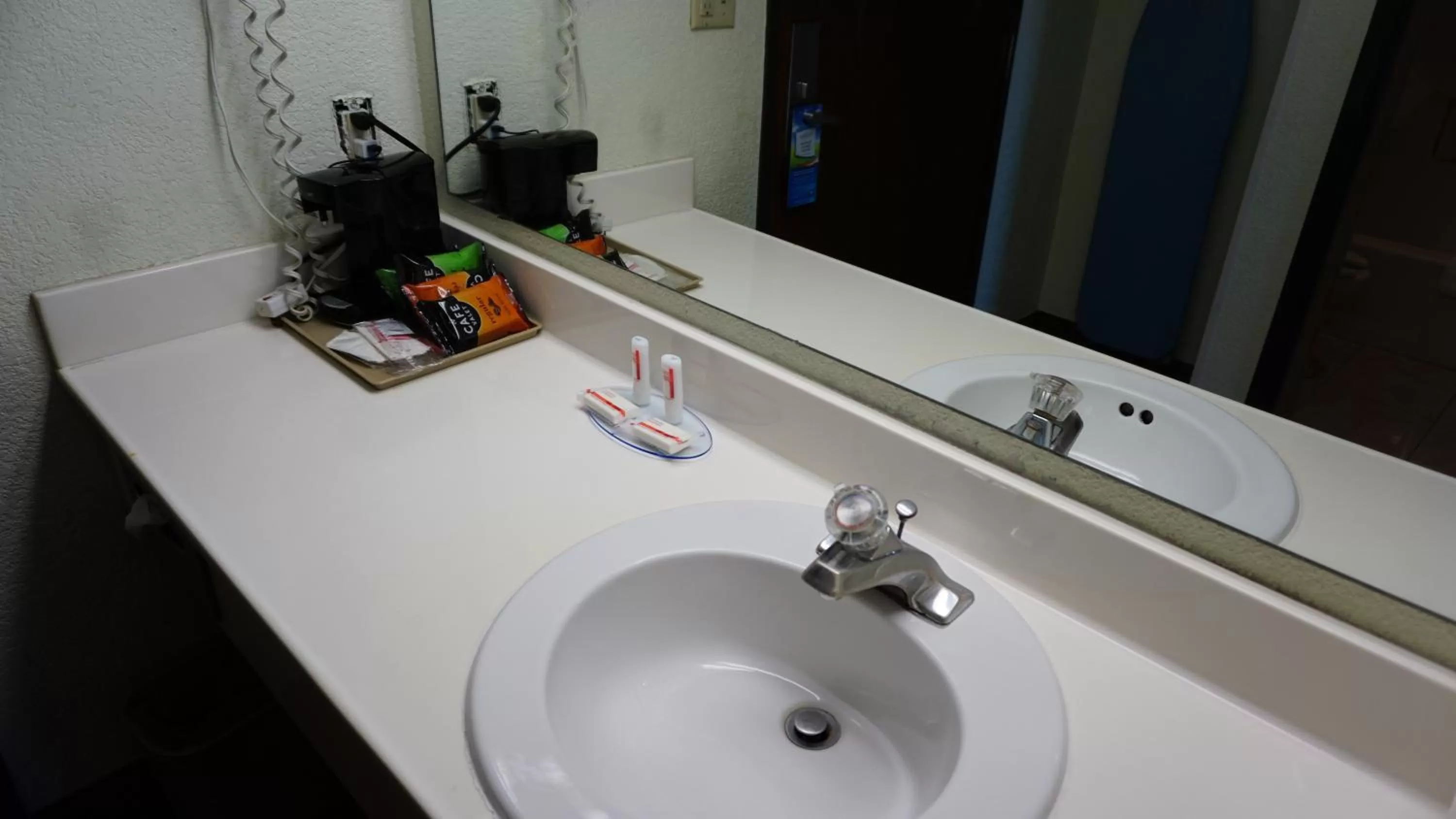 Bathroom in Baymont by Wyndham Arlington At Six Flags Dr