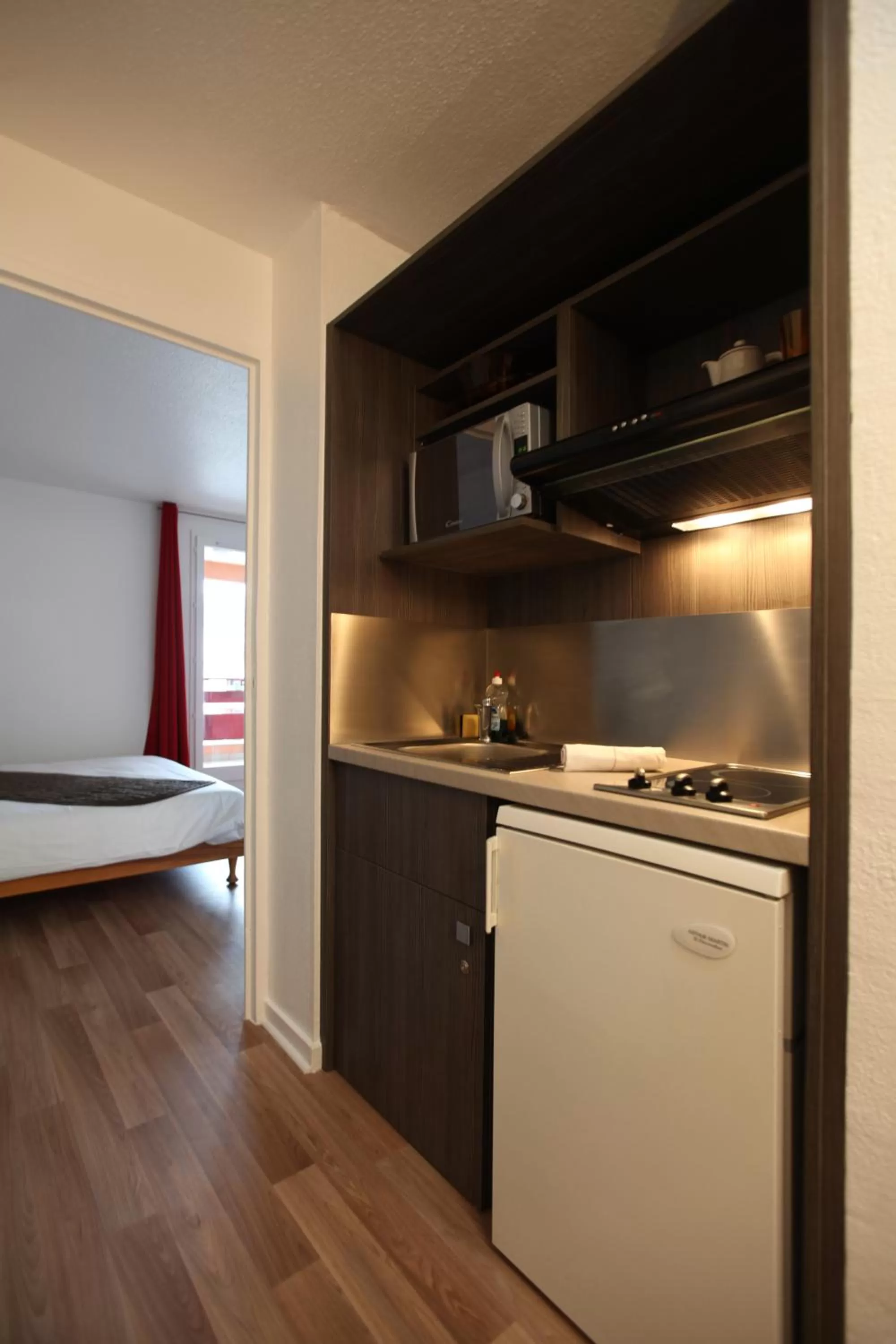 Kitchen or kitchenette in Geneva Residence