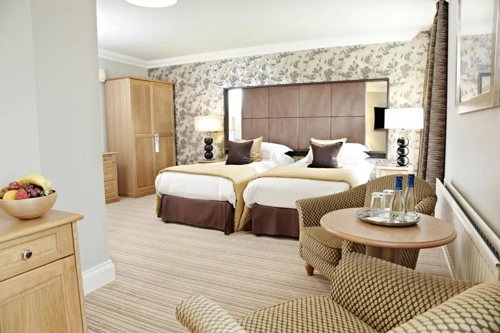 Photo of the whole room, Bed in Trout Hotel