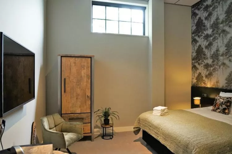 Bed in Boutique Hotel De Oude Veste