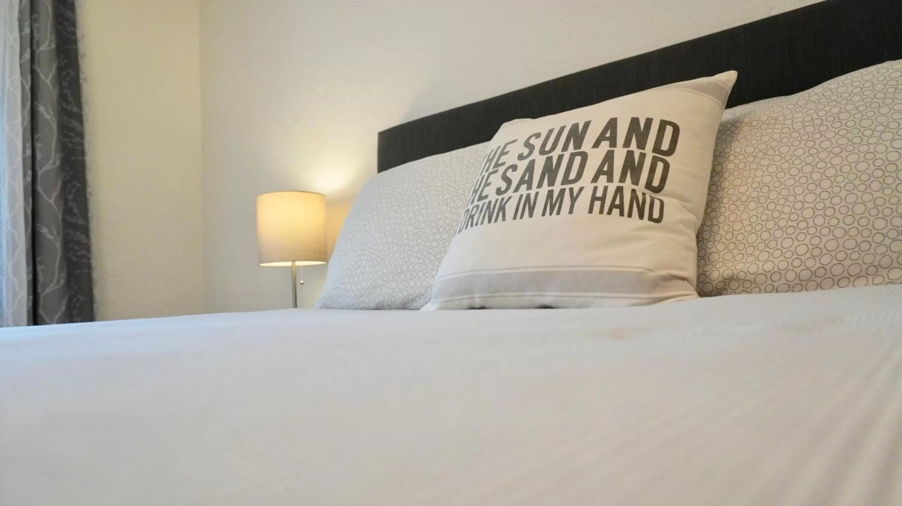 Bed in 4145 By The Sea Inn & Suites