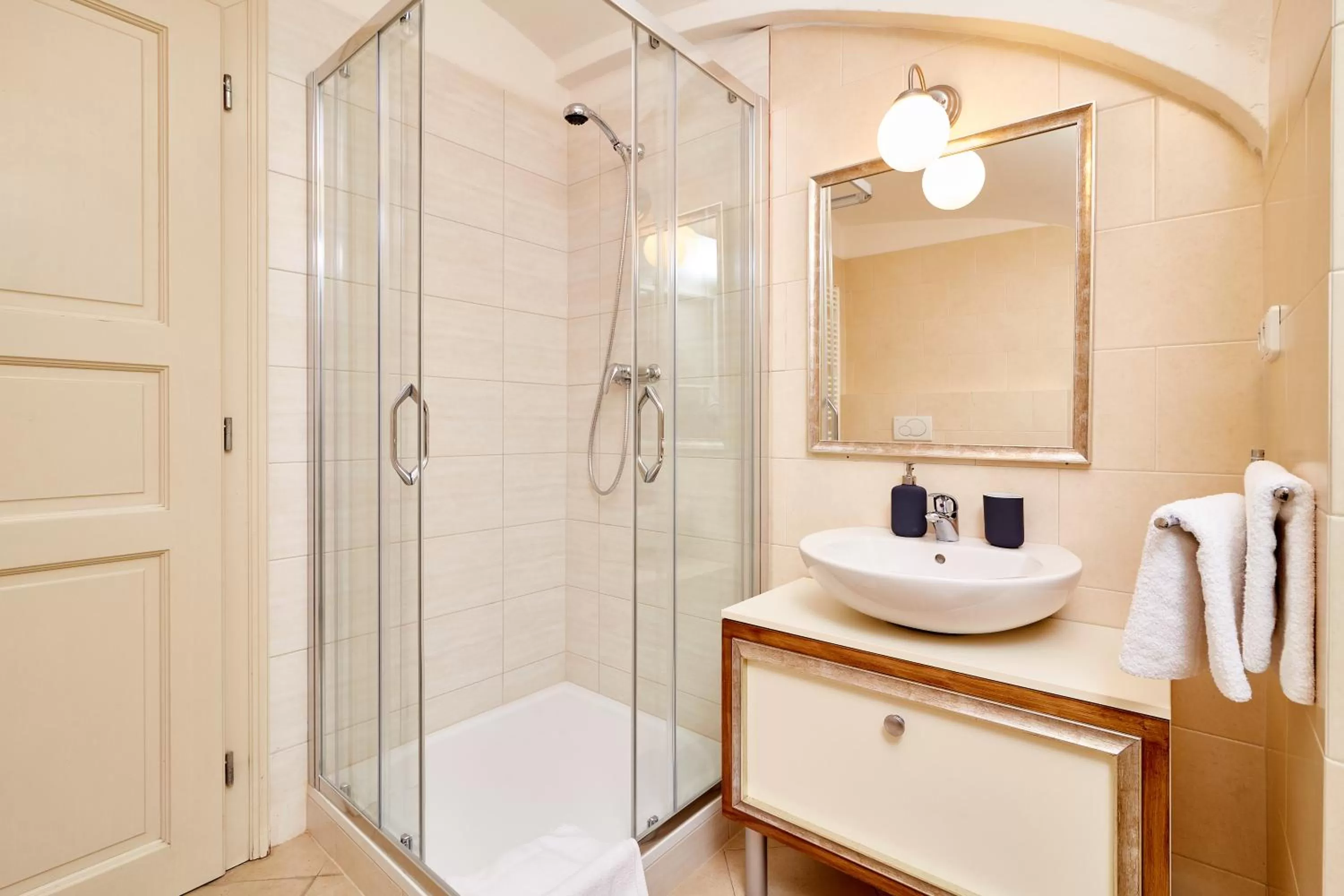 Shower in Three Golden Crowns Apartments